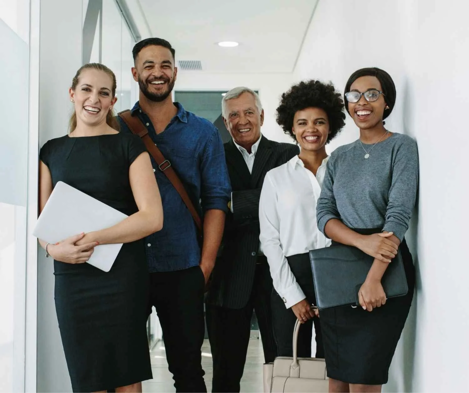 A group of people smiling together