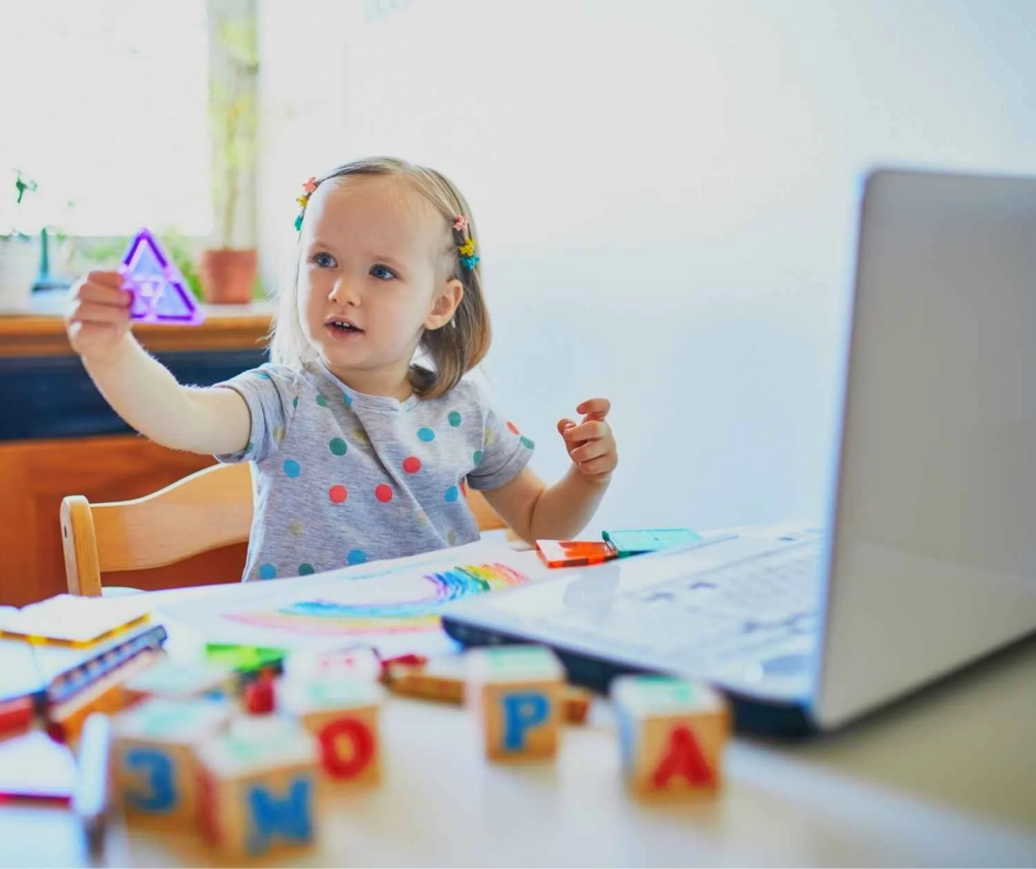 preschooler in a playful online speech session