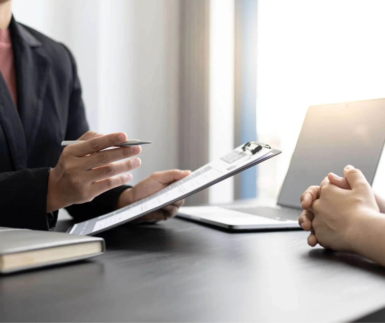Job candidate answering a question during an interview
