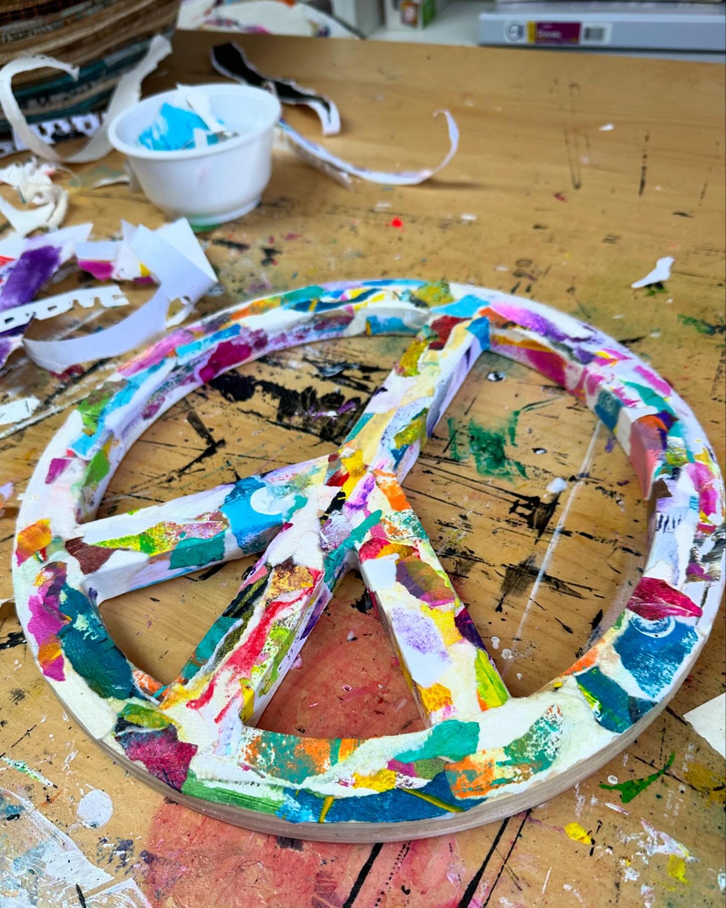 I&rsquo;ve been working on a couple 12&rdquo; peace symbols collages to have available for my open studio May 25-26th. Hopefully I will get all three finished in time. Each collage is created from tearing up my abstract art on paper and collaging it 
