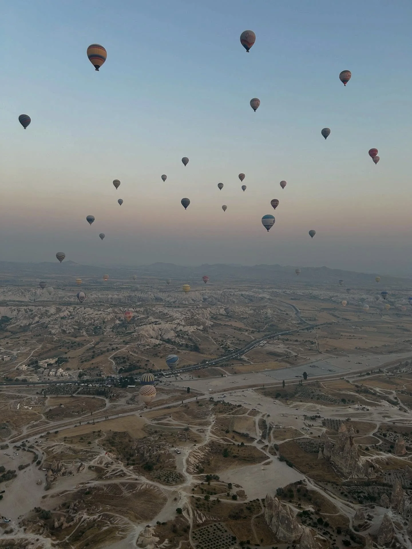 Cappadocia from above: volcanic valleys, fairy chimneys, and 150+ balloons dotting the sky. Fear of heights aside, this was pure magic and proof that you can do it too! 

We had the best balloon pilot brought out for this ride by my local tour partne