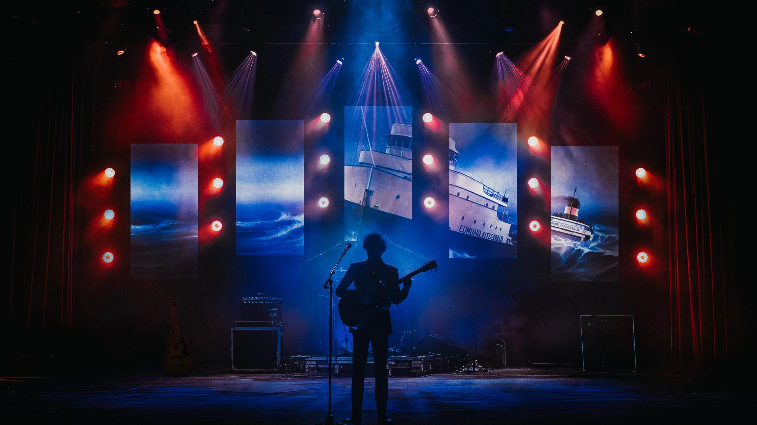 Gordon Lightfoot Concept: Stage concept inspired by Gordon Lightfoot’s tone and storytelling, using silhouette, restrained lighting, and subtle visuals to create a cinematic and intimate live environment.