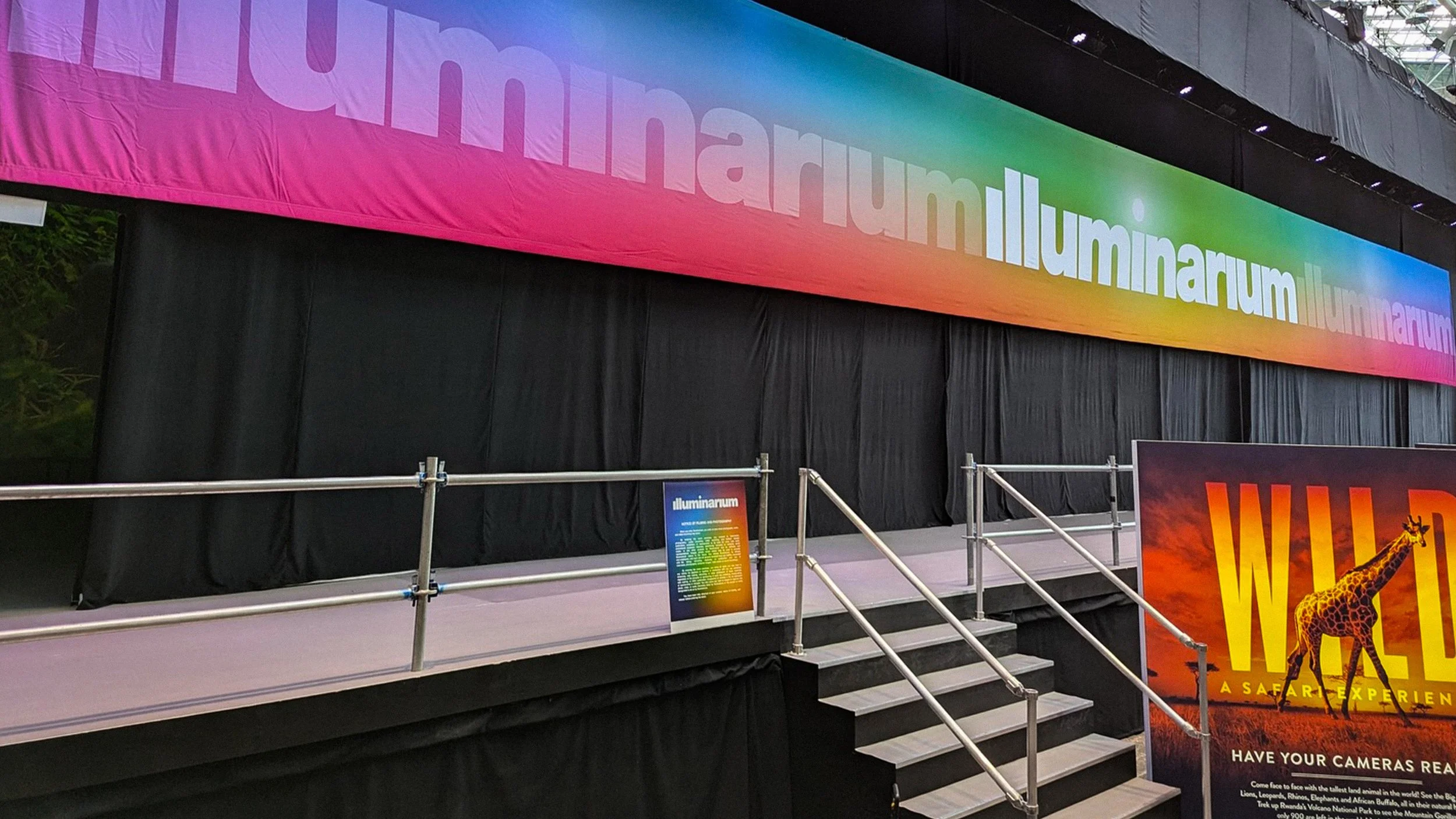 Exterior Banner System: Large-scale banner application designed to extend the brand across the venue, maintaining visibility and consistency at a distance.