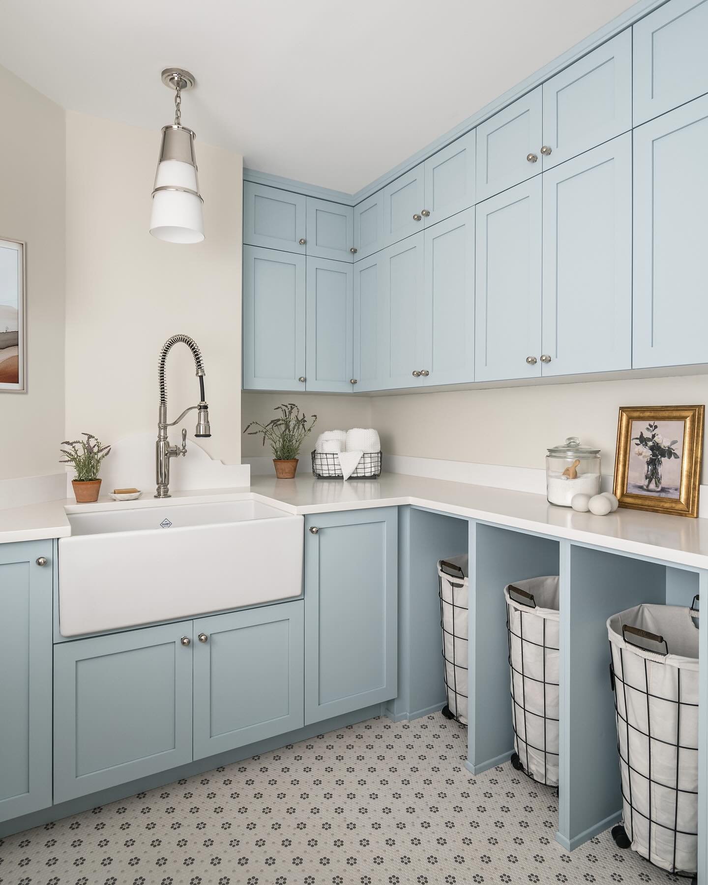 I wouldn&rsquo;t mind doing laundry if I could do it in a space this cute! 🧺 our goal for the laundry room at our #AutumnLakeProject was to create more storage &amp; maximize the functionality of an awkwardly shaped room. While we kept the other are