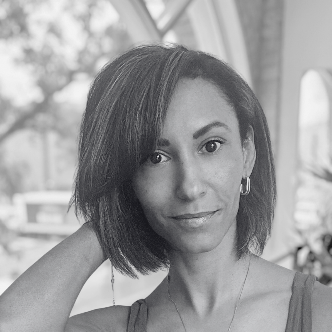 black and white photo of instructor Tricia in the studio