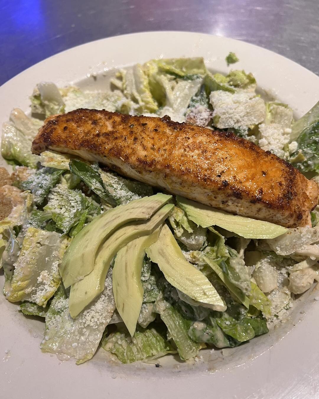 Come try our delicious Salmon Caesar Salad! 🥗