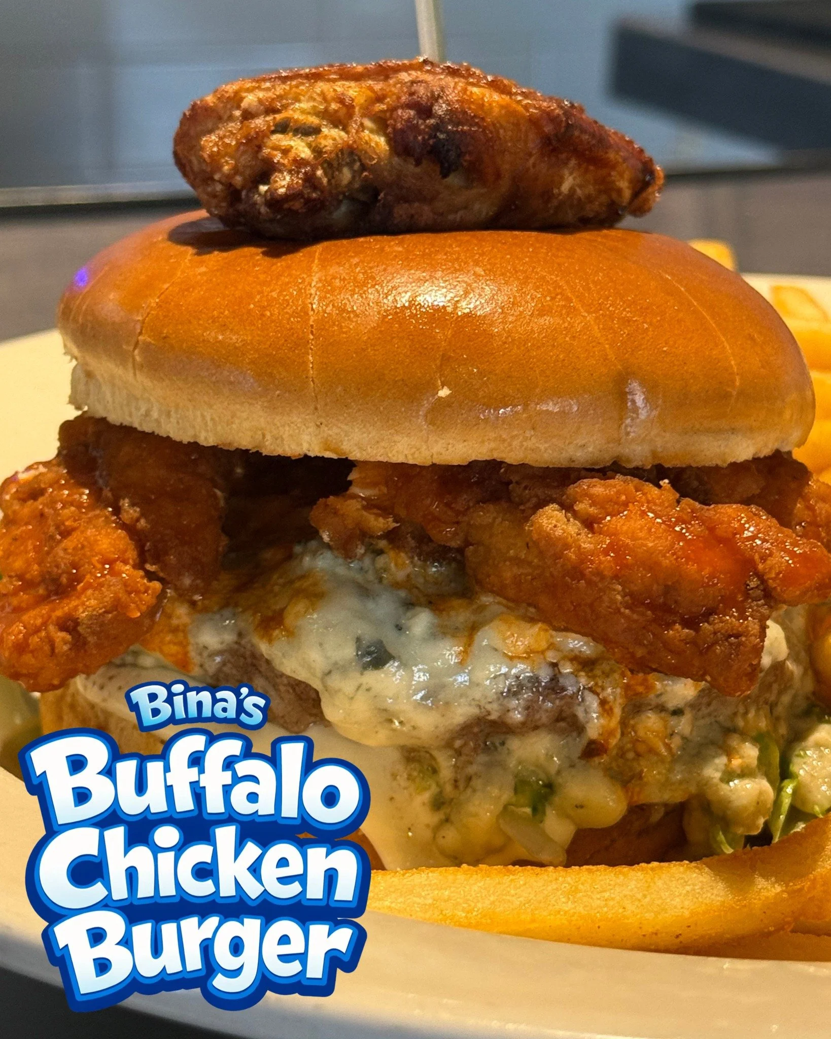 🔥🍔 April Burger of the Month is bringing the HEAT 🍔🔥
Bina&rsquo;s Buffalo Burger 🐔🌶️

Stacked on a brioche bun with a prime patty, buffalo tenders, spring mix, and loaded with blue cheese crumbles + blue cheese dressing (or ranch if that&rsquo;