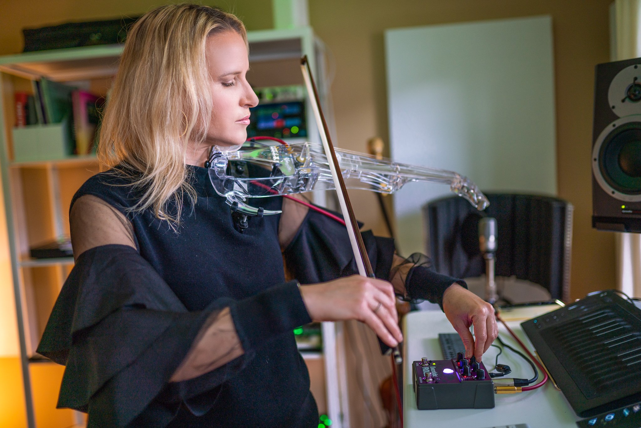 laura escude in the studio with violin