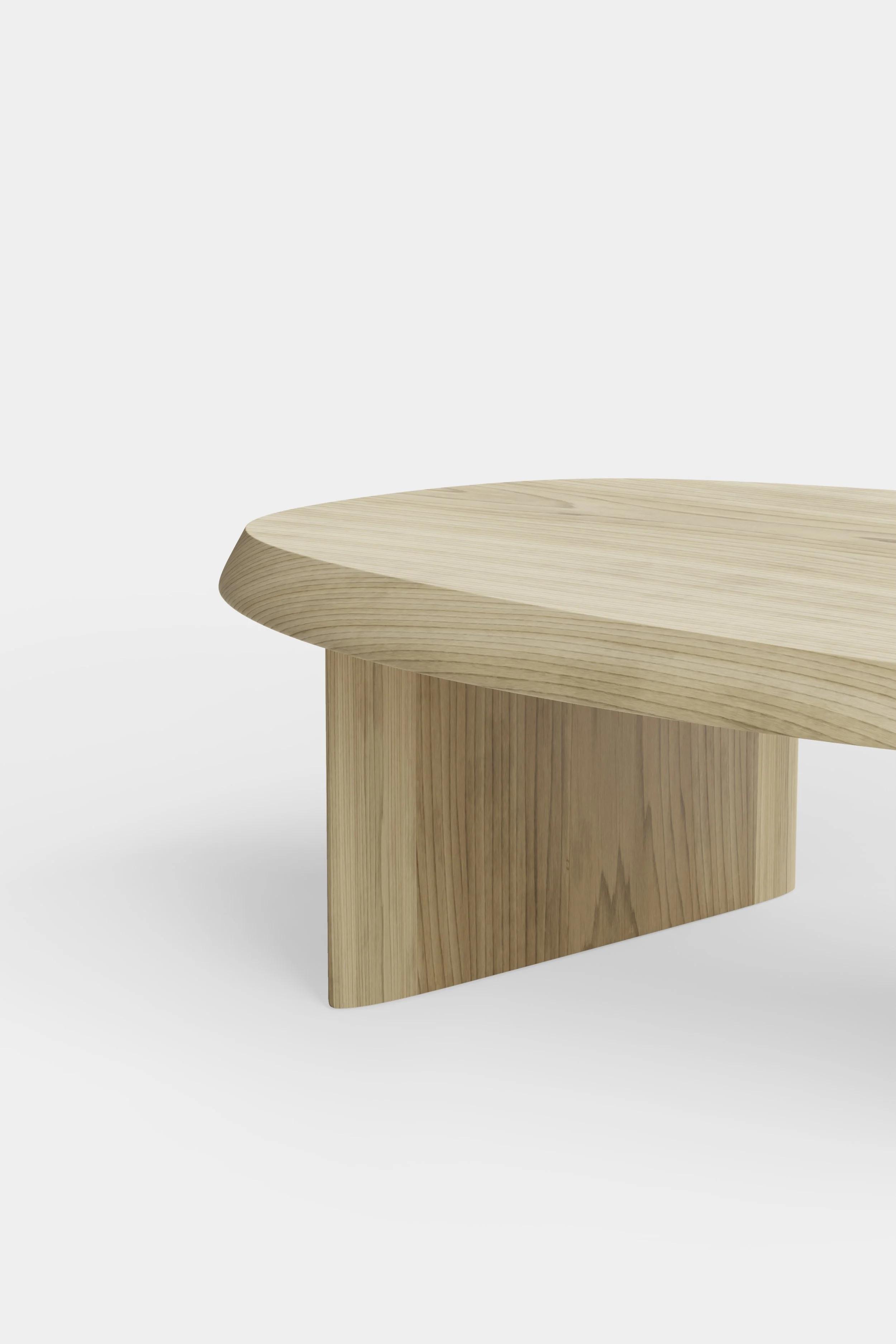 Solid poplar oval coffee table designed by Joel Escalona