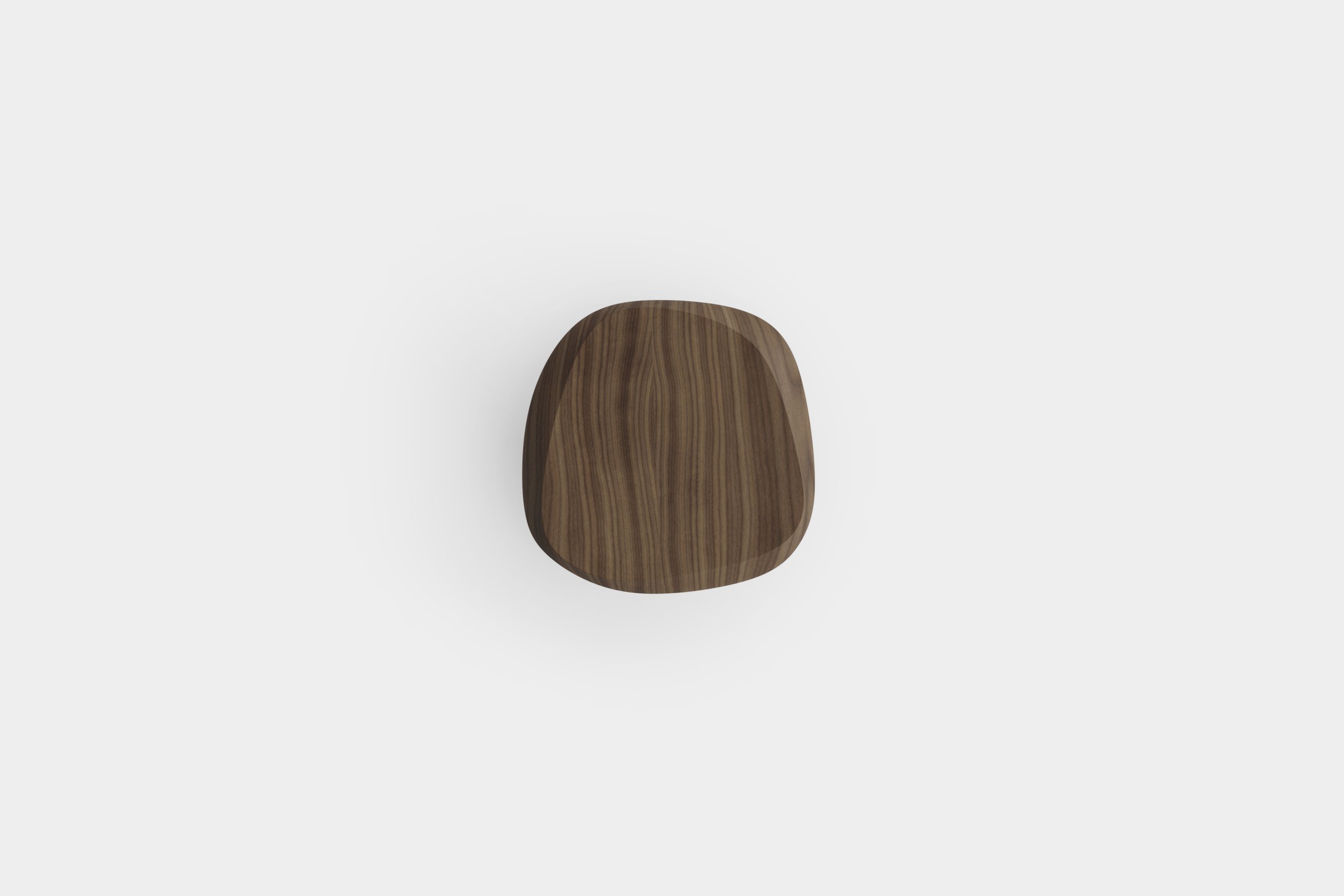 Walnut round side table designed by Joel Escalona