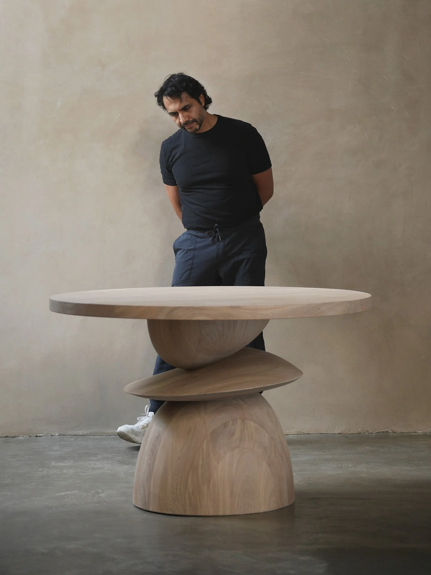 In the creation of our Socle Dining Table, we were drawn to the idea of turning every meal into an artistic statement. The use of solid wood and a unique, sculpted base reflects a blend of functionality with a nod to historical artistry, making every