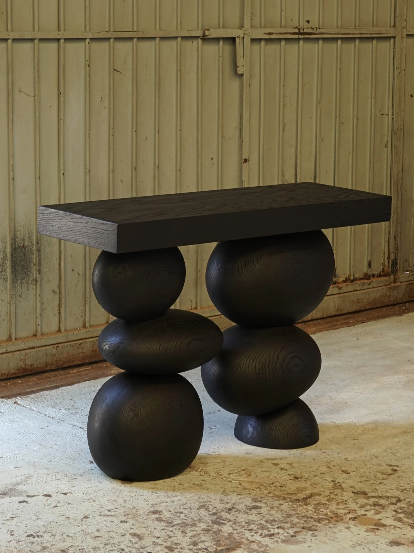 In the Elefante Sideboard, we aimed to blend the raw power of Brutalist design with the soft elegance of round shapes. This fusion results in a piece that is both strong and graceful, adding a unique touch to your interior decor.

&mdash;
For inquiri