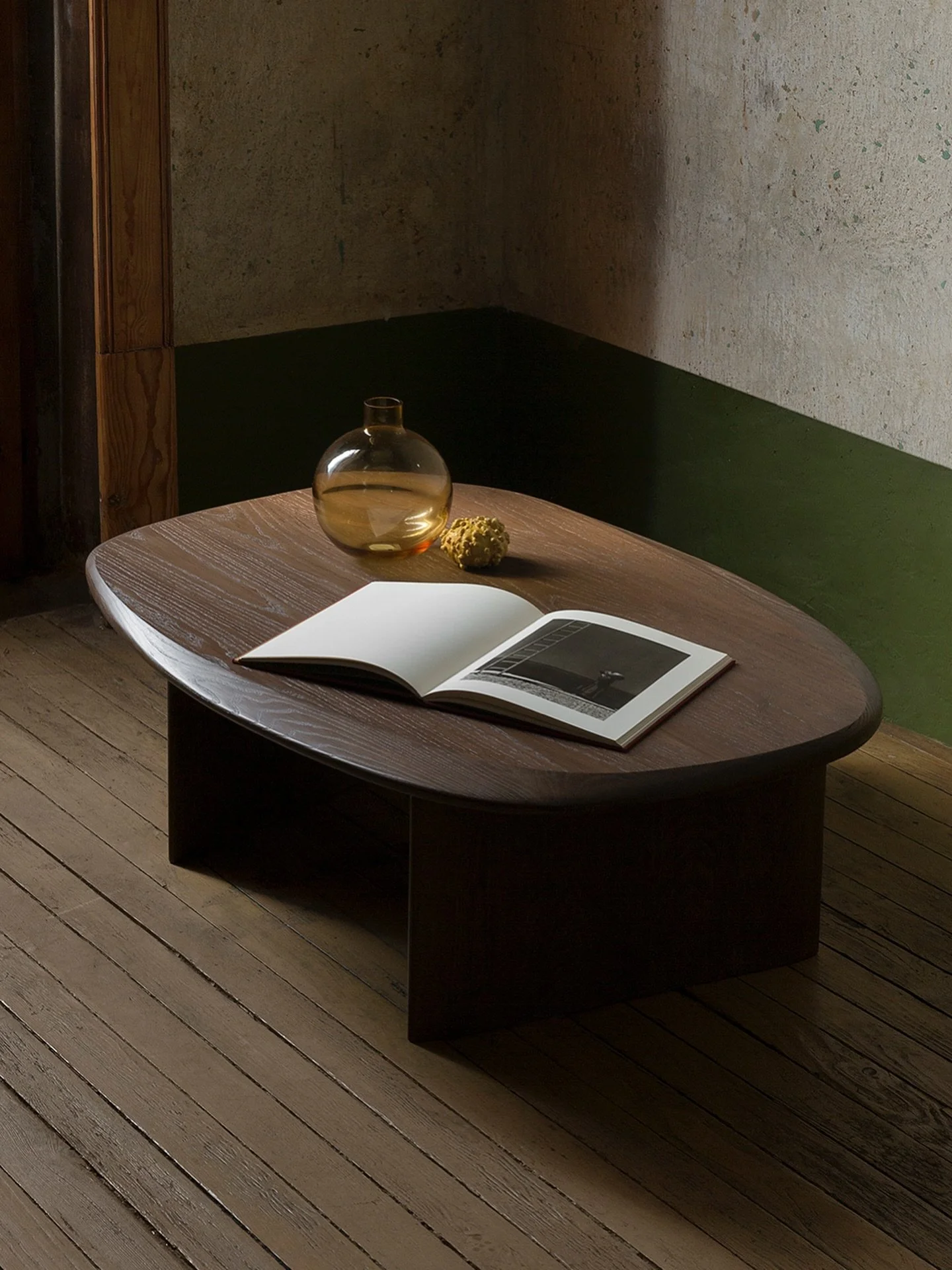 The Duna Coffee Table&rsquo;s design reflects the timeless beauty of nature. Inspired by the sinuous lines of sand dunes, its smooth walnut wood surface and elegant base evoke a sense of calm and stability, perfect for grounding your living space.
&m