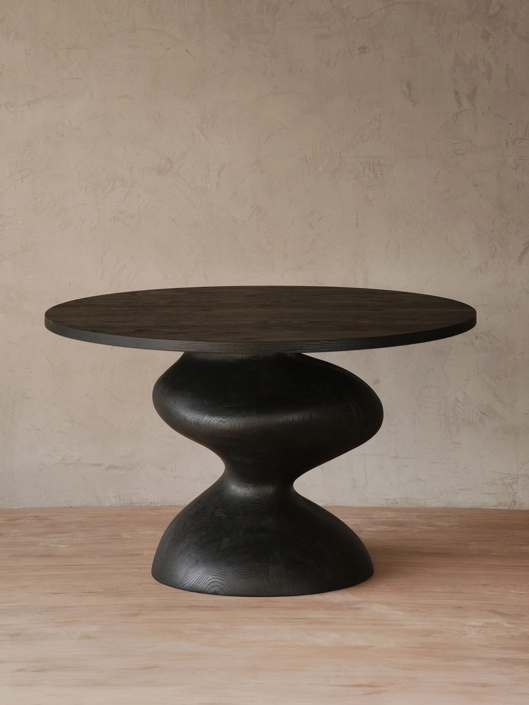 This Socle Dining Table is built in red oak with a black finish. The sculptural base carries most of the visual weight while the top stays clean and restrained.

#diningtable #solidwood #interiordesign