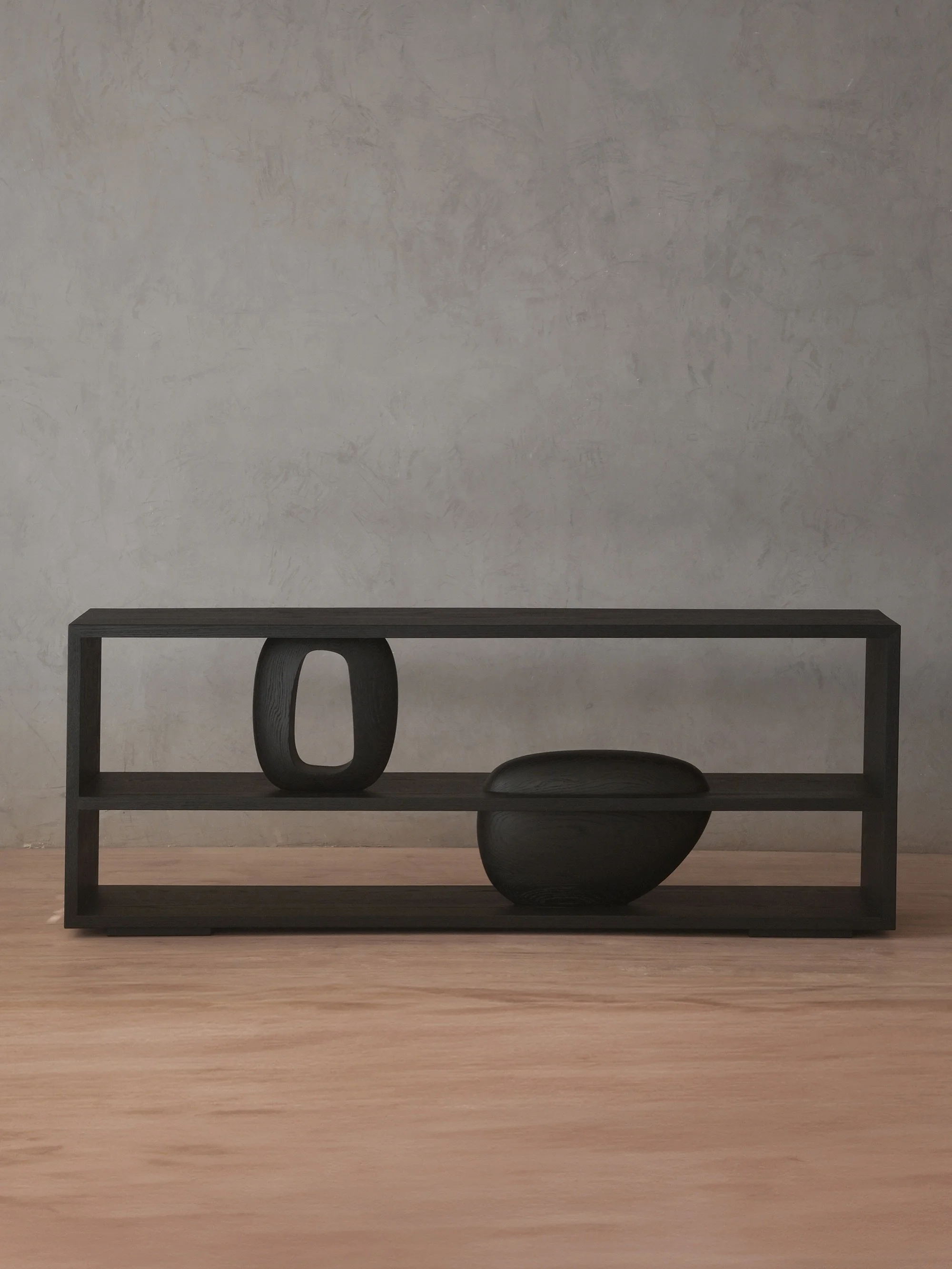 Most furniture has a side it hopes nobody sees. Sereno does not. Its form holds from every angle, allowing the console to leave the wall and stand where furniture becomes much harder to fake, directly in the middle of real life.

That freedom makes i