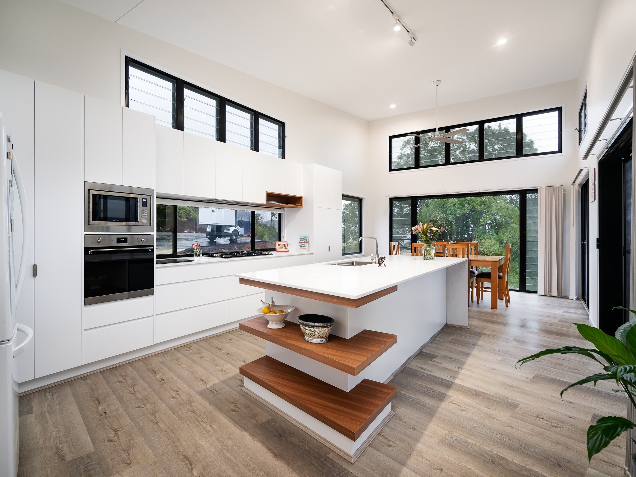 High level windows, minimal but functional kitchens