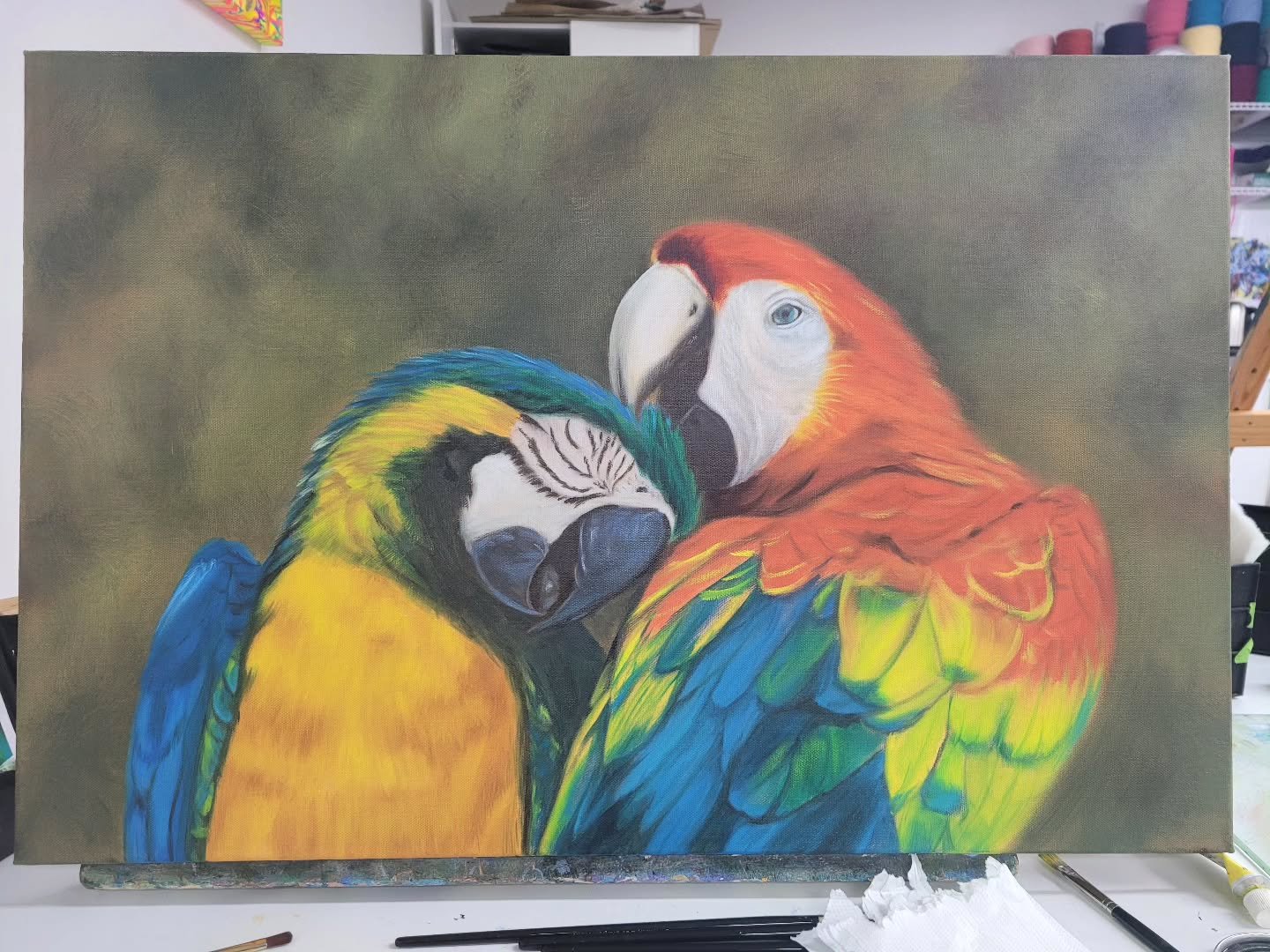 WIP Day 2 - it's really taking shape now. I'm surprised how quickly it all comes together. I think I'll make the deadline after all.
Today, I focused on finishing covering the rest of the canvas. So, the wings and chest. Then, I reworked both fa