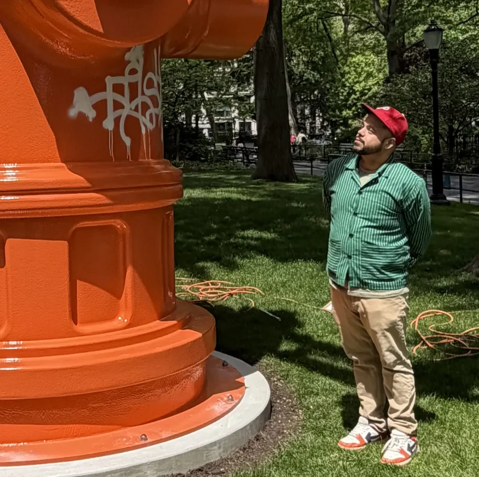 Lugo’s 15-foot orange fire hydrant is at once a monument to childhood memory, a wink at the tradition of monumental public sculpture and a tribute to the resourcefulness of communities that make do. Photo by Jamie Lubetkin