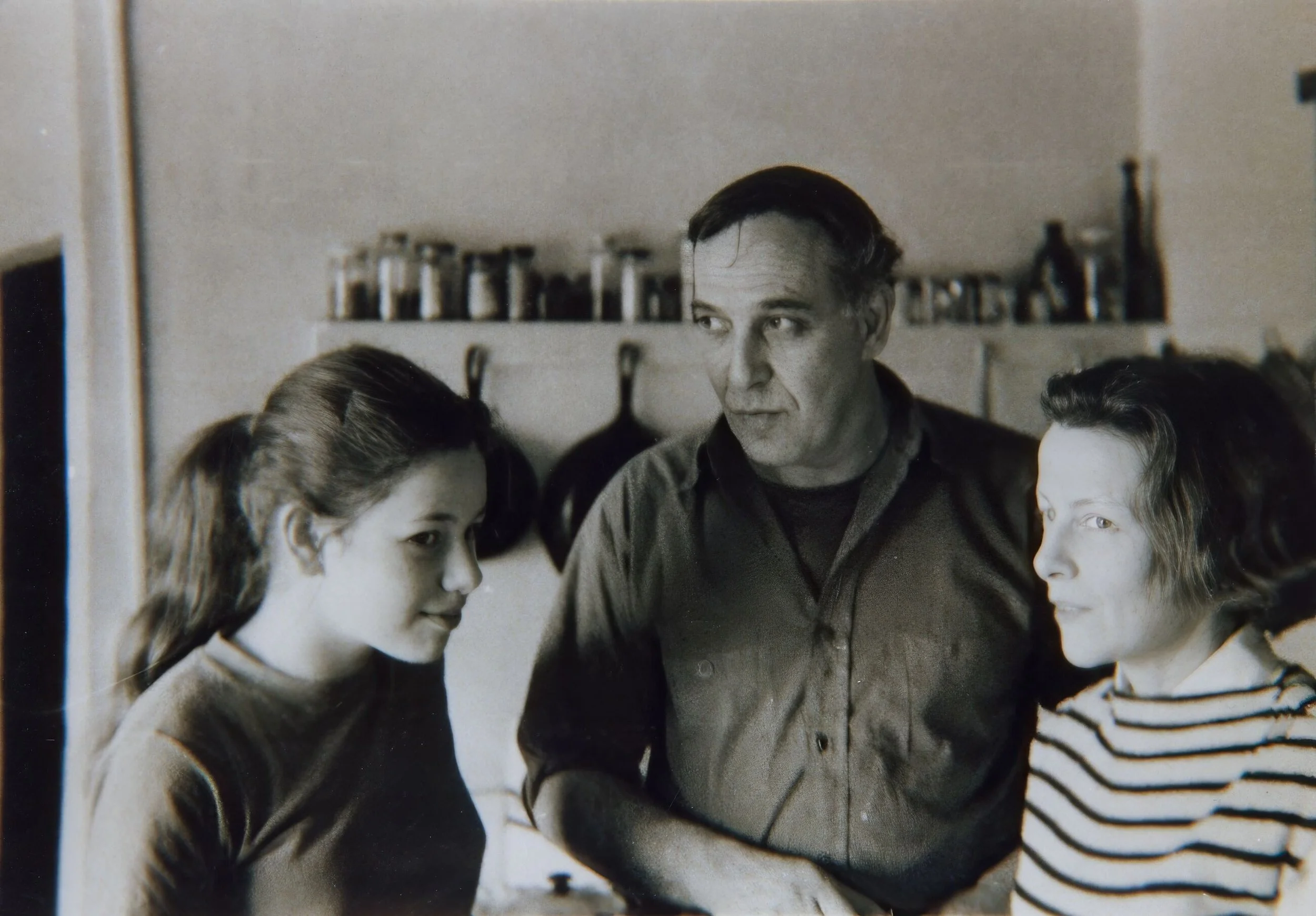 Musa Mayer, Philip Guston and Musa McKim photographed together in the kitchen of their Woodstock home in 1956.