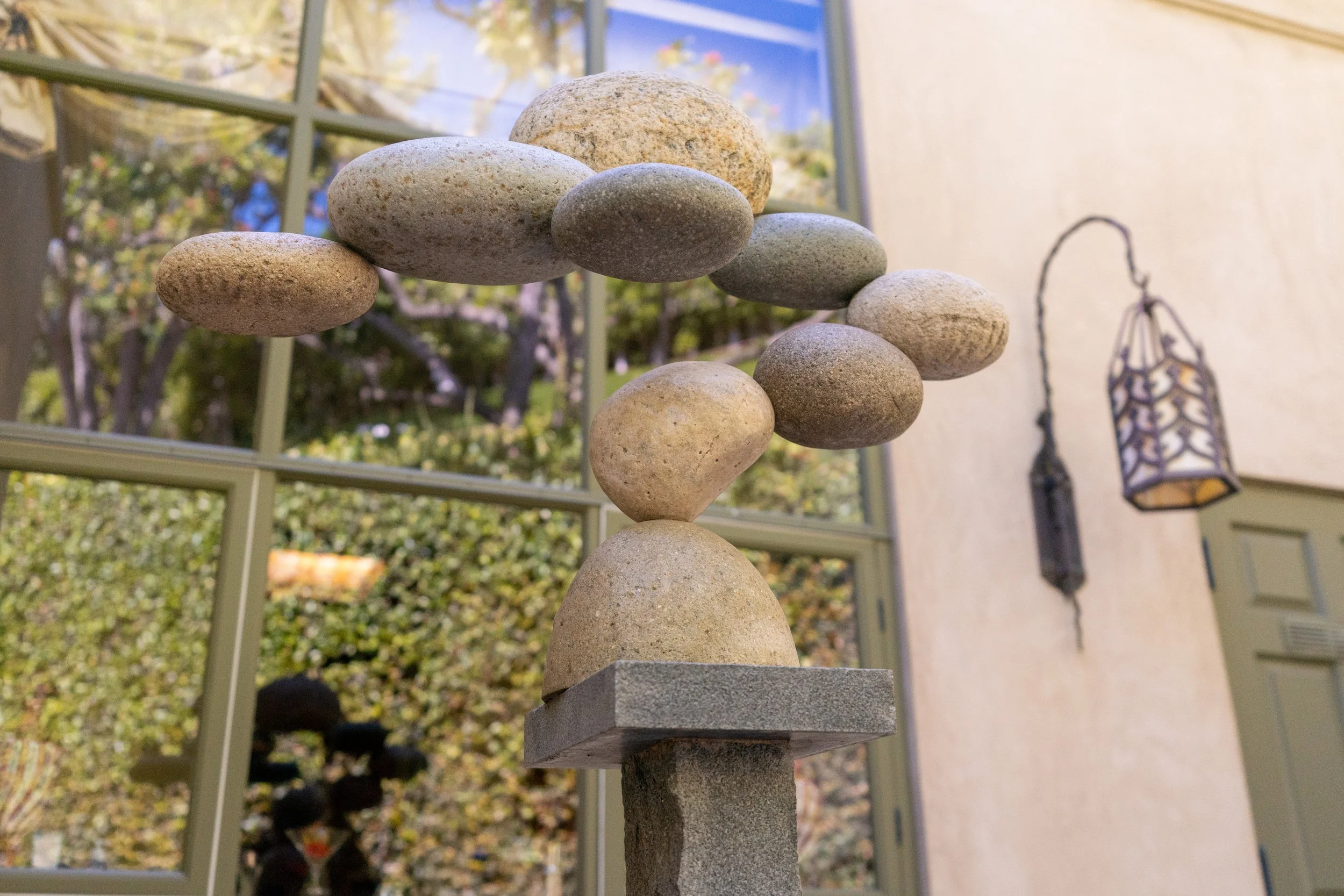 "Sculpture I," a stone and steel work by Woods Davy, an American sculptor. His works combine balance and tension.
