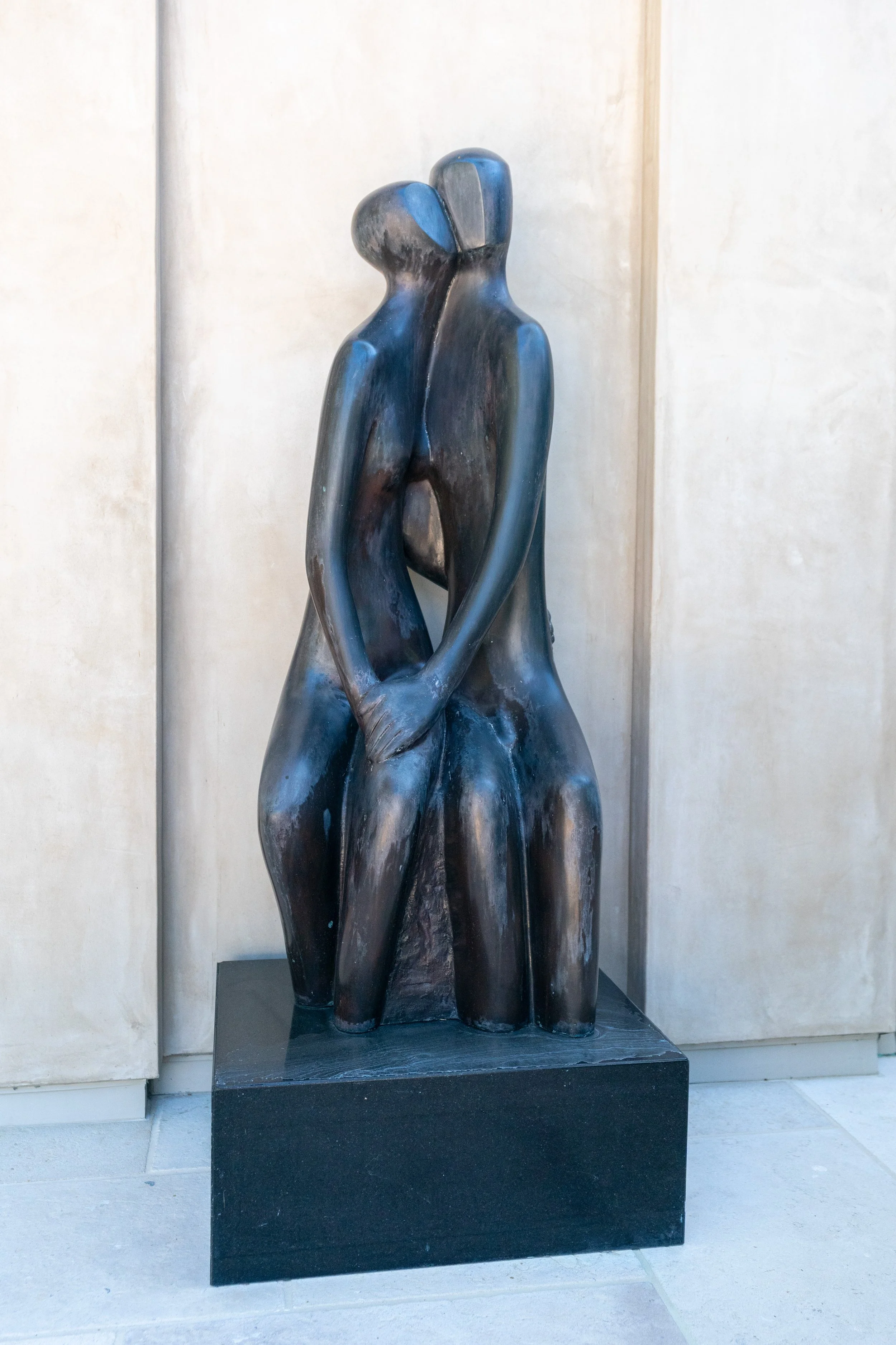 "Lovers" by Noemi Schindler. The first "Lovers" was a small sculpture that Glorya kept in her living room. She loved it so much that she requested this life-size version.