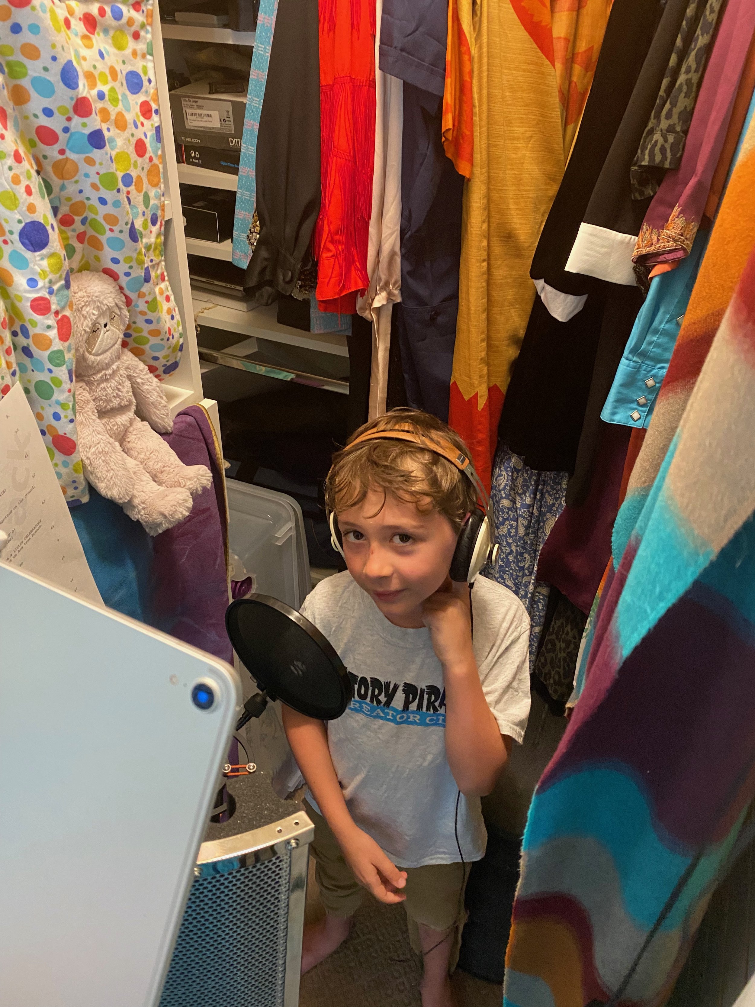 Recording voice overs in a closet.