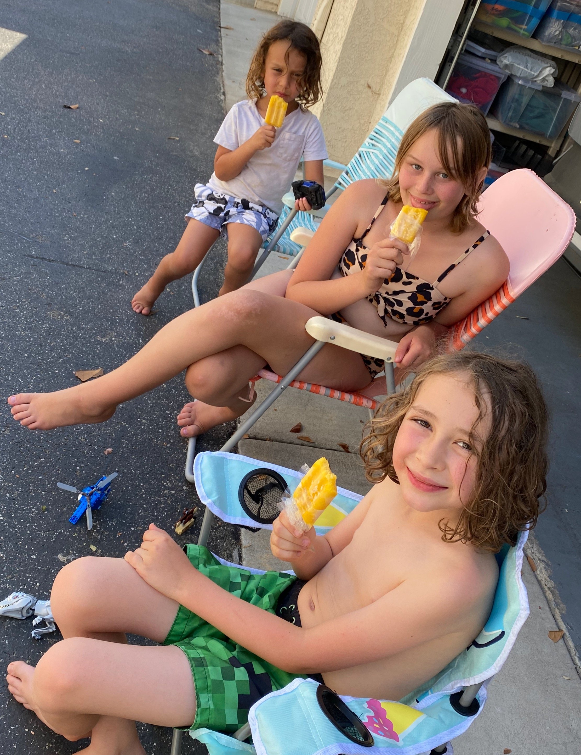 Popsicles in Lawn Chairs in my old alley.