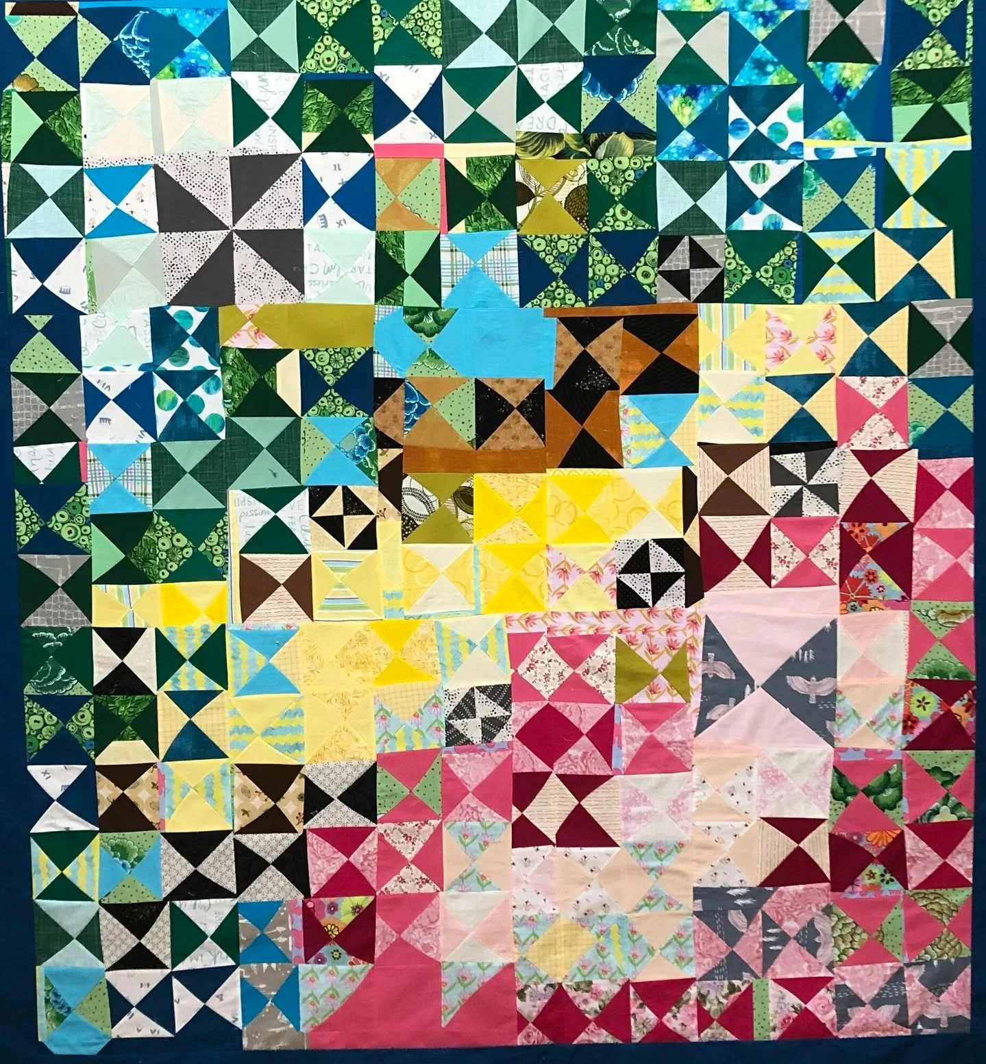 Melodye Marks @melzybabe made this beautiful Hour Glass quilt variation in the 2025 Block Squad. 

Here's her review as a new improviser... 

"The Improv that Block Squad is a wonderful way to let go of classic perfection methods and embrace met