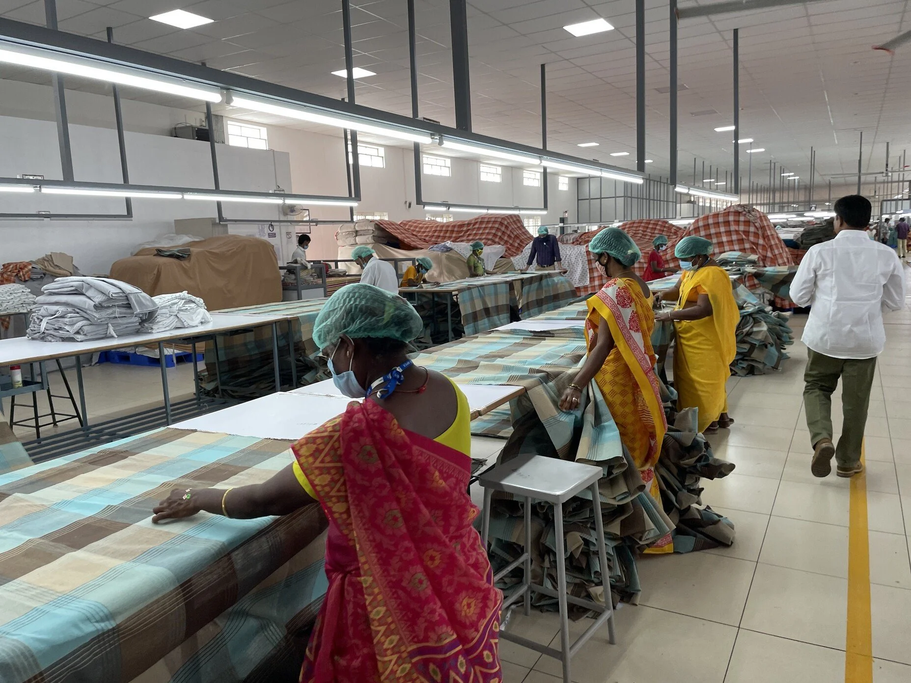 Clothing manufacturer in India uses quality control to ensure production quality.