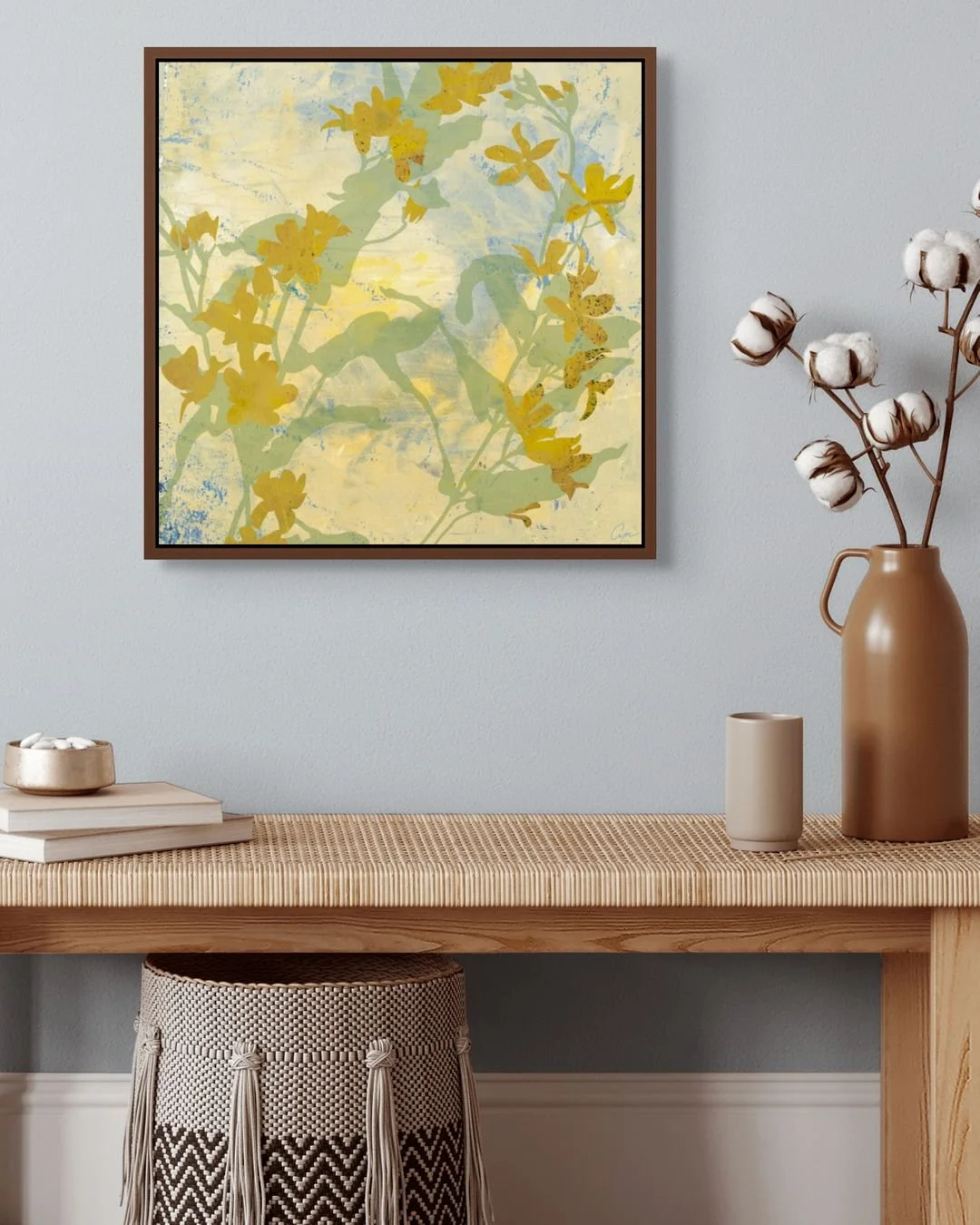 &quot;Sunniva&quot; (pronounced SOON-ee-vah) is an Old Norse name meaning gift of the sun. This artwork carries that spirit&mdash;light-filled, layered, and tender. Delicate yellow blooms rise through soft sage leaves and sky-washed blues, creating a