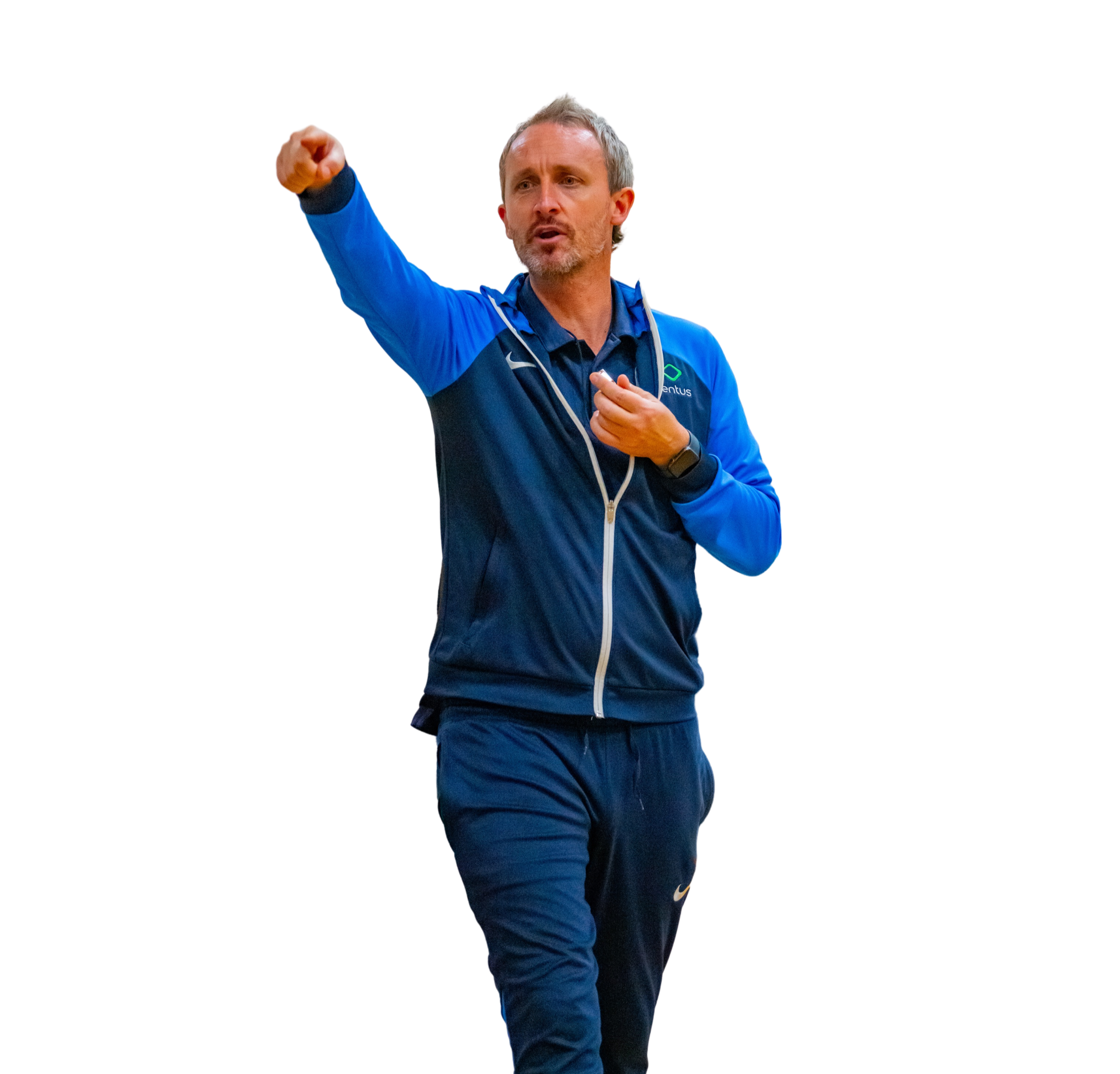 A man with gray hair and beard wearing a blue sports jacket and pants, pointing and speaking passionately, possibly coaching or giving instructions.