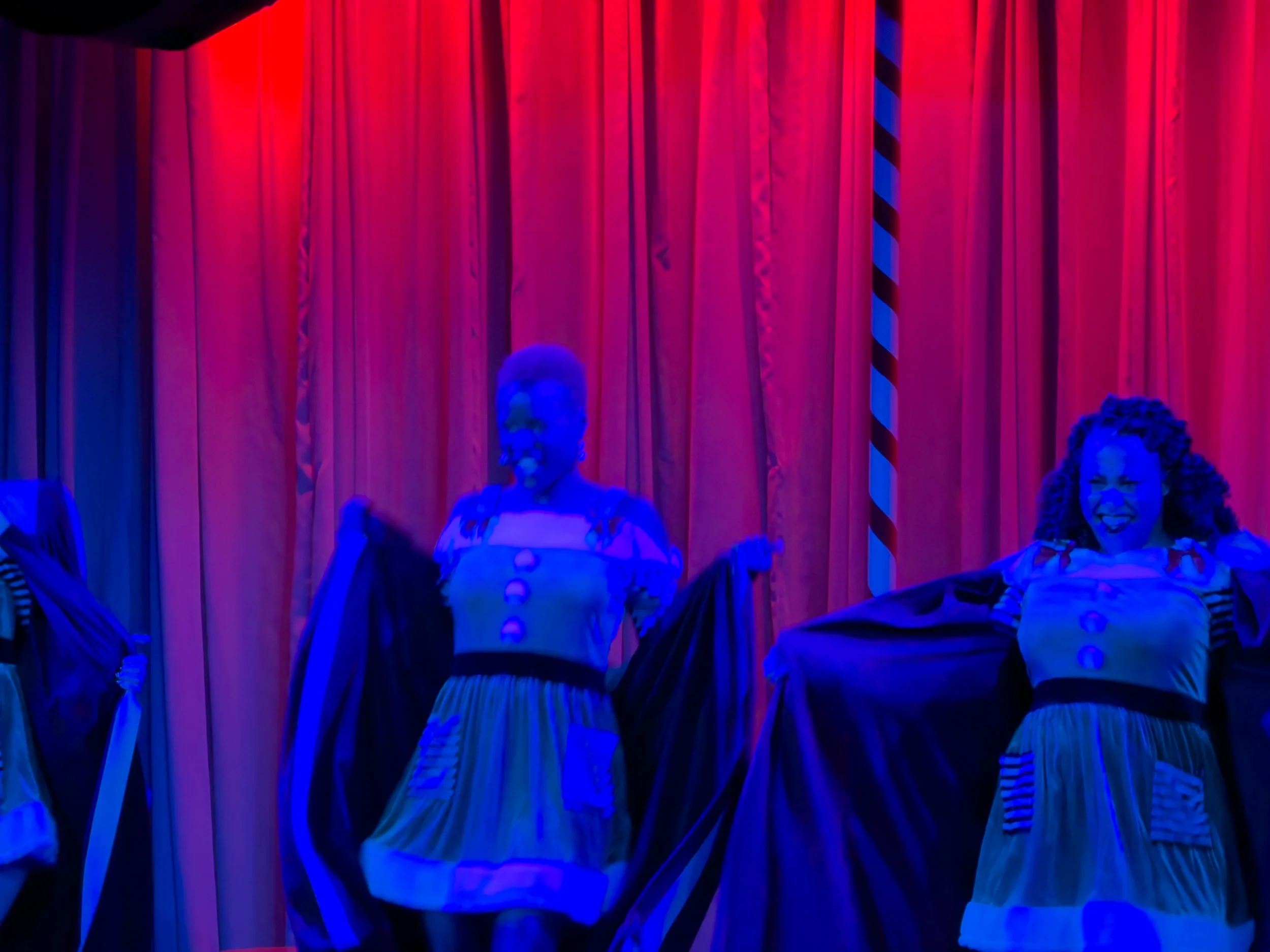 The Ladies lose the choir robes during "Ho Ho Ho"
