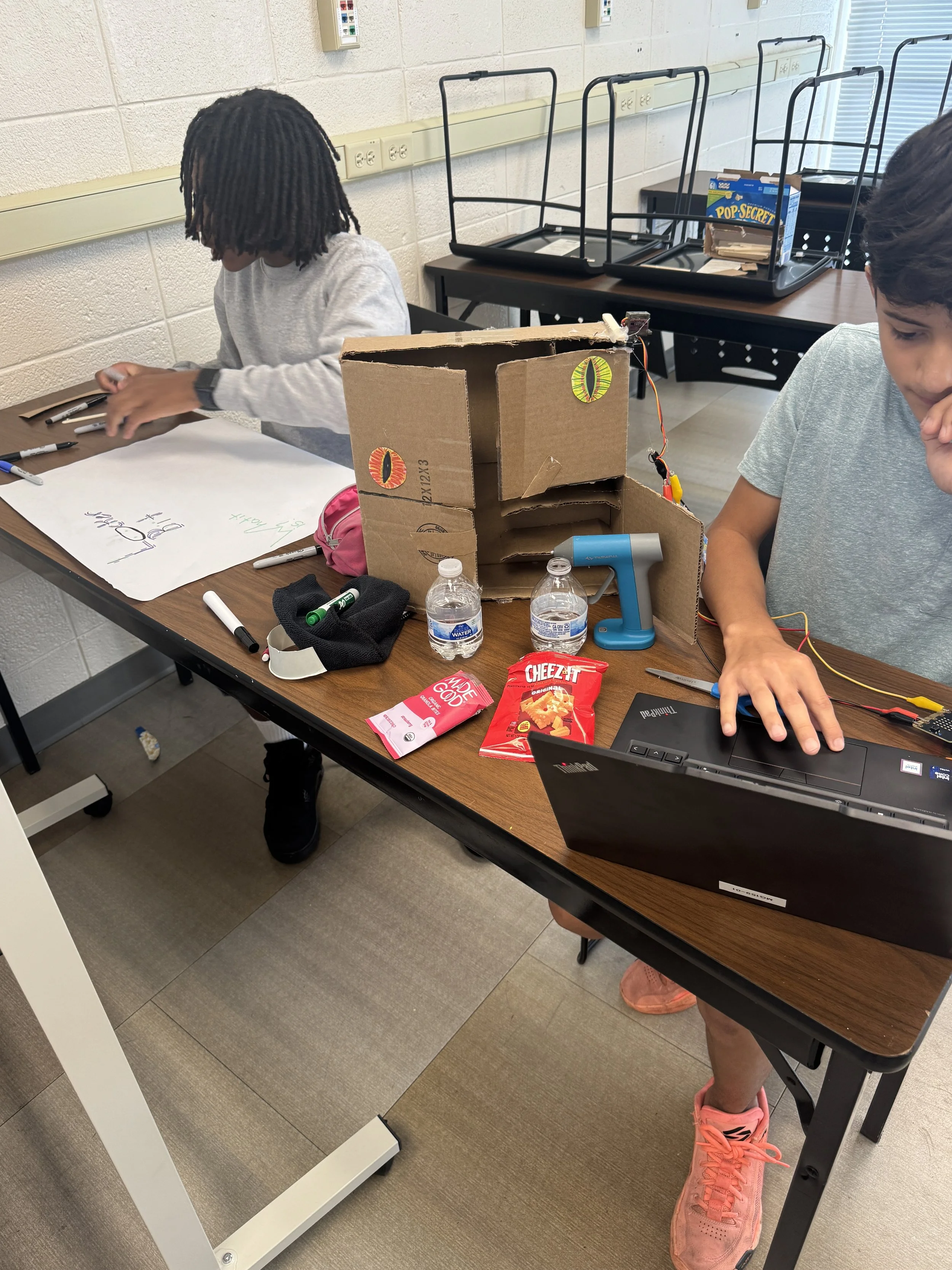 Students working on their solution, a smart organizer called the Bit Locker.