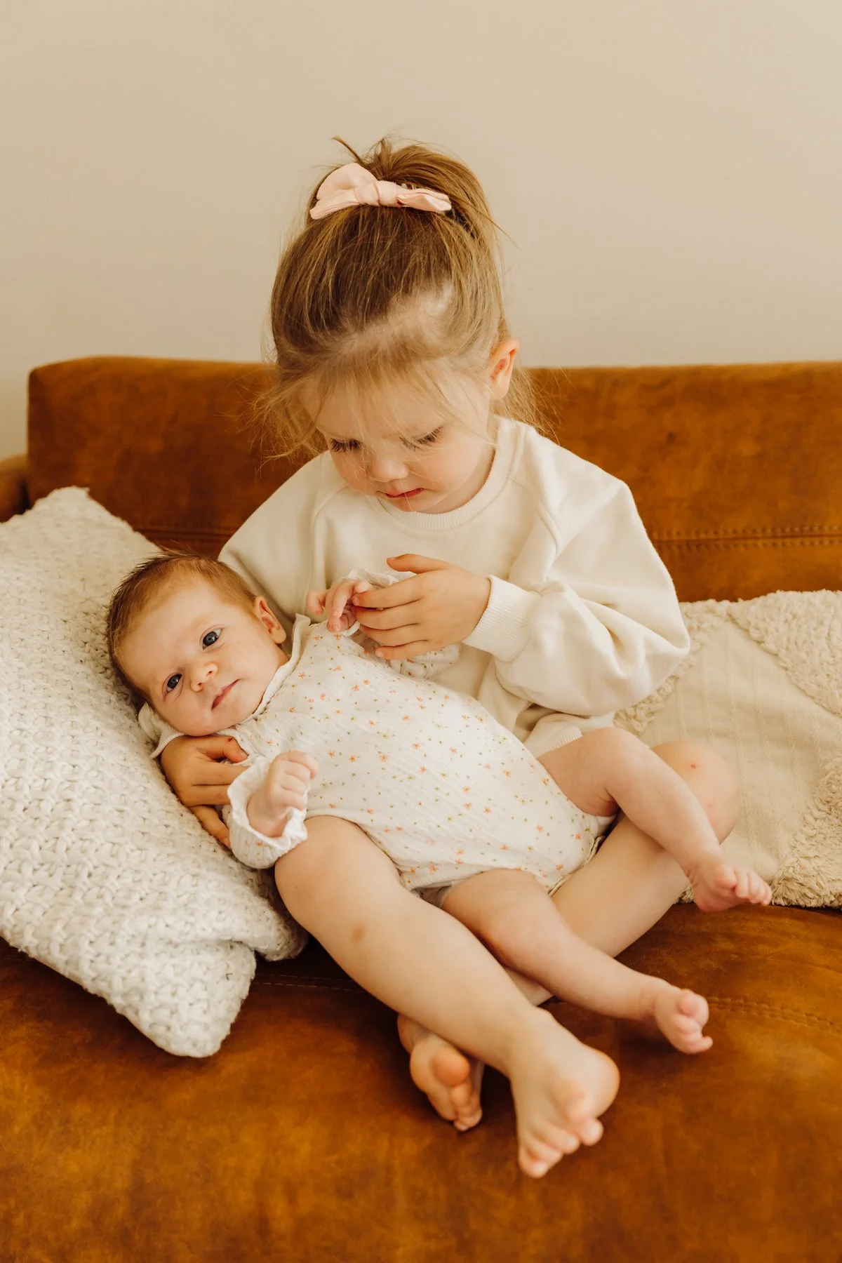 Big sister and little sister. Newborn sibling photo Longford