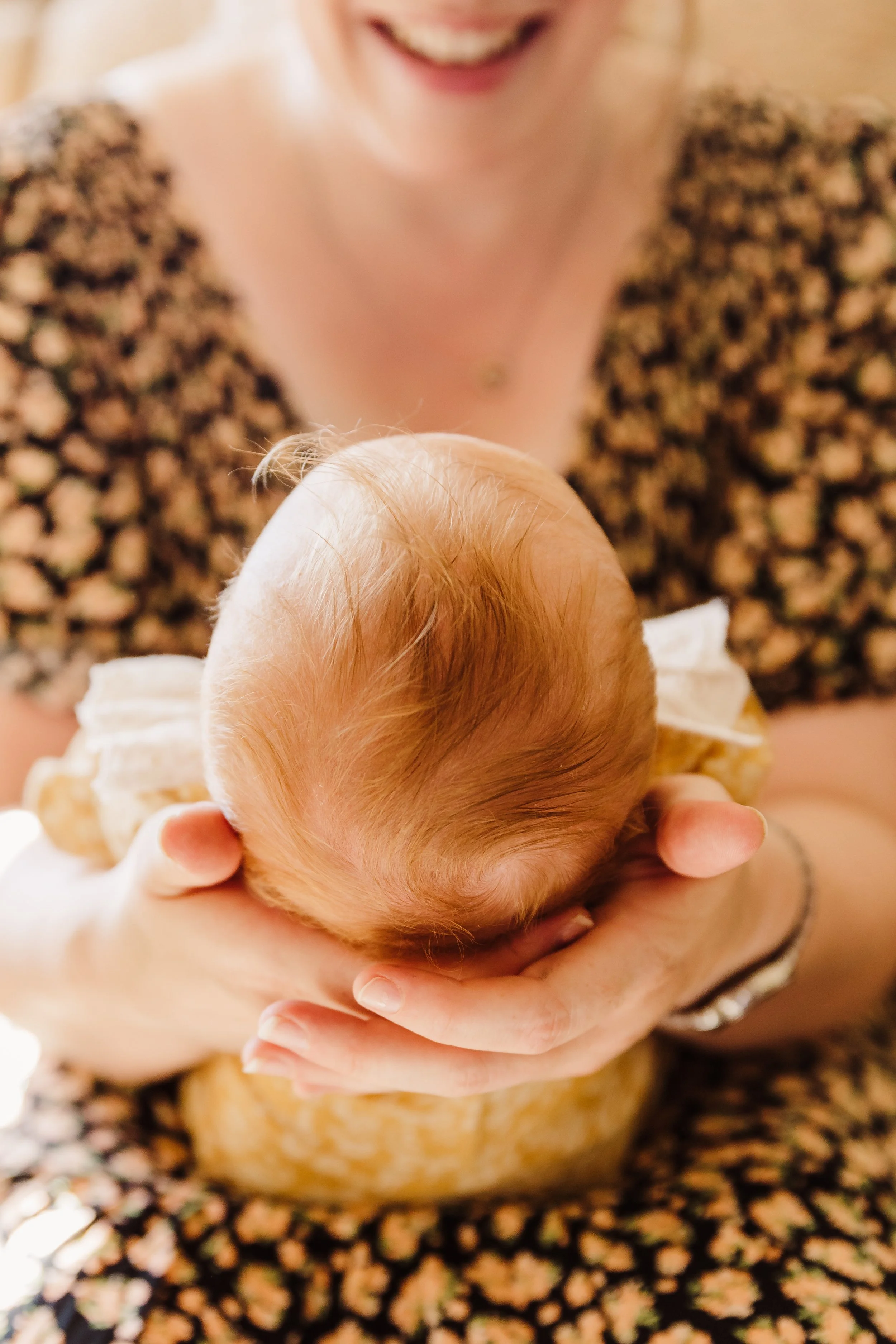 mum holding newborn all the details