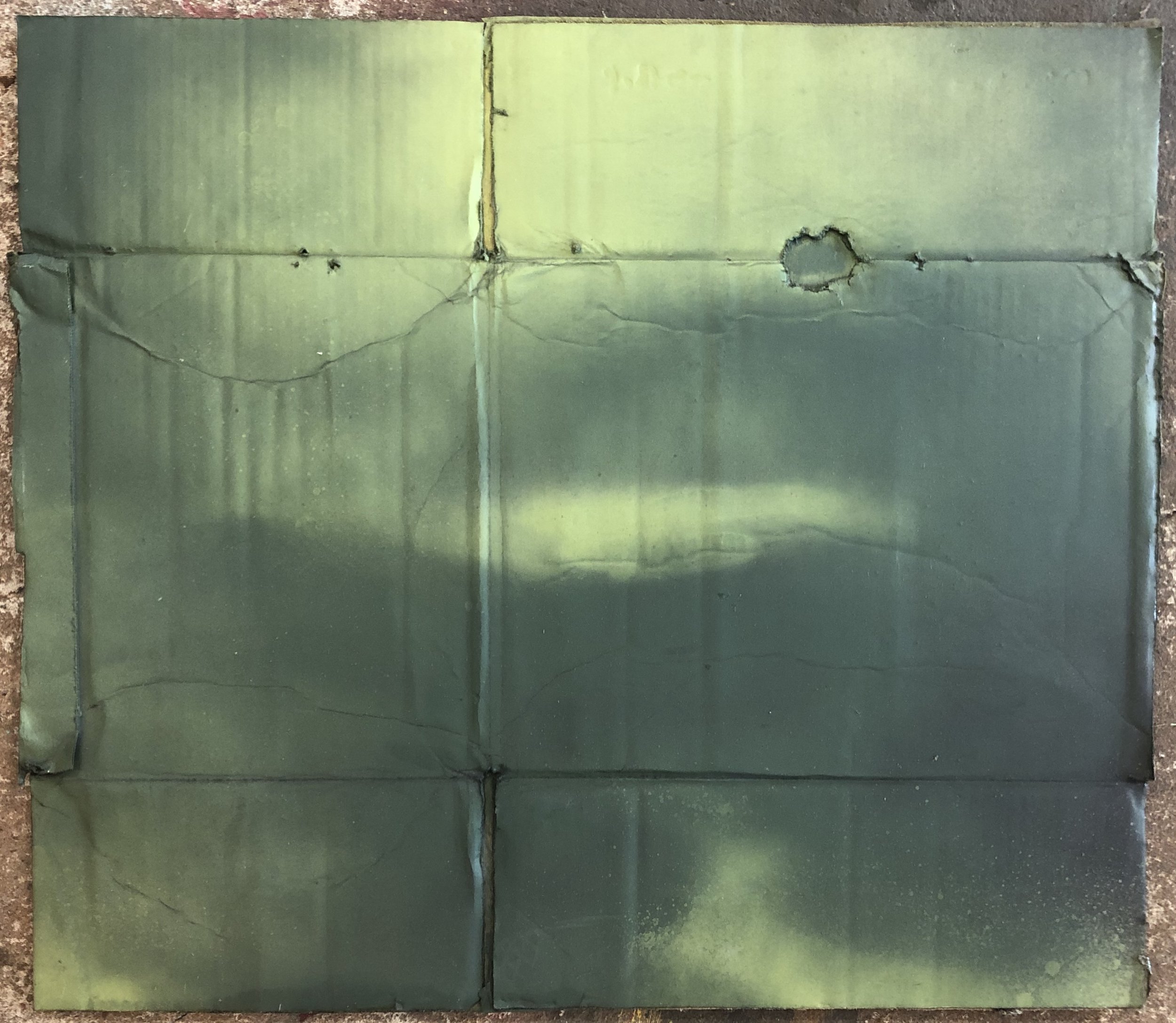 Spray paint on cardboard