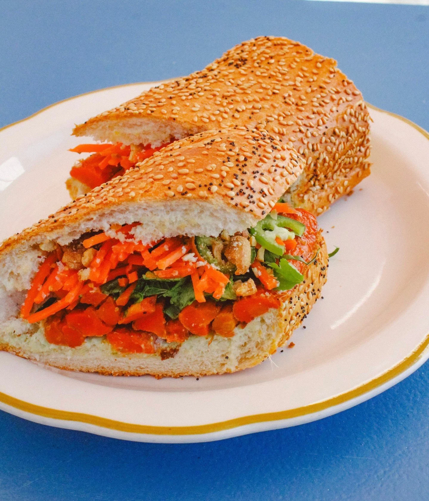 Do you carrot all about what we post on instagram these days? 🥕🥕🥕 Spicy Thai Carrot Sandwich is here! A bright and punchy vegan option even a carnivore will enjoy.