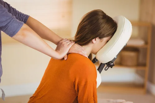 Student receiving a chair massage