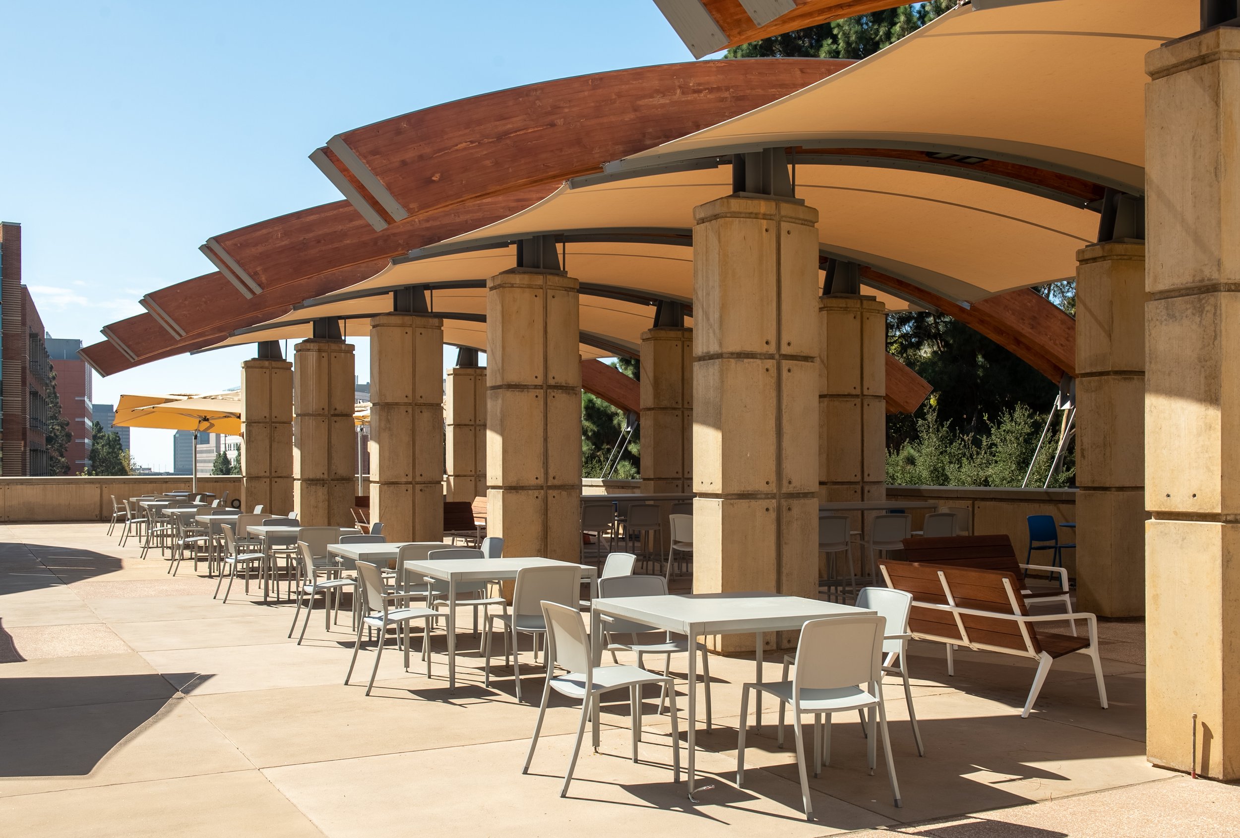 Outdoor patio with covered area and tables and chairs