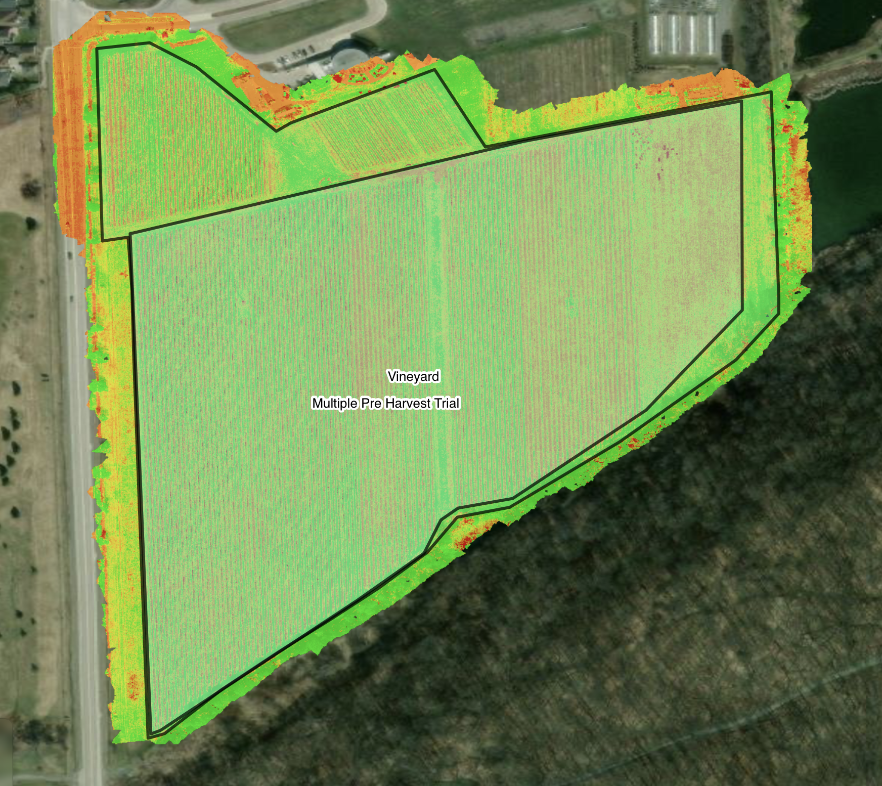 Aerial view of vineyard with color-coded map overlay indicating multiple pre-harvest trial plots.