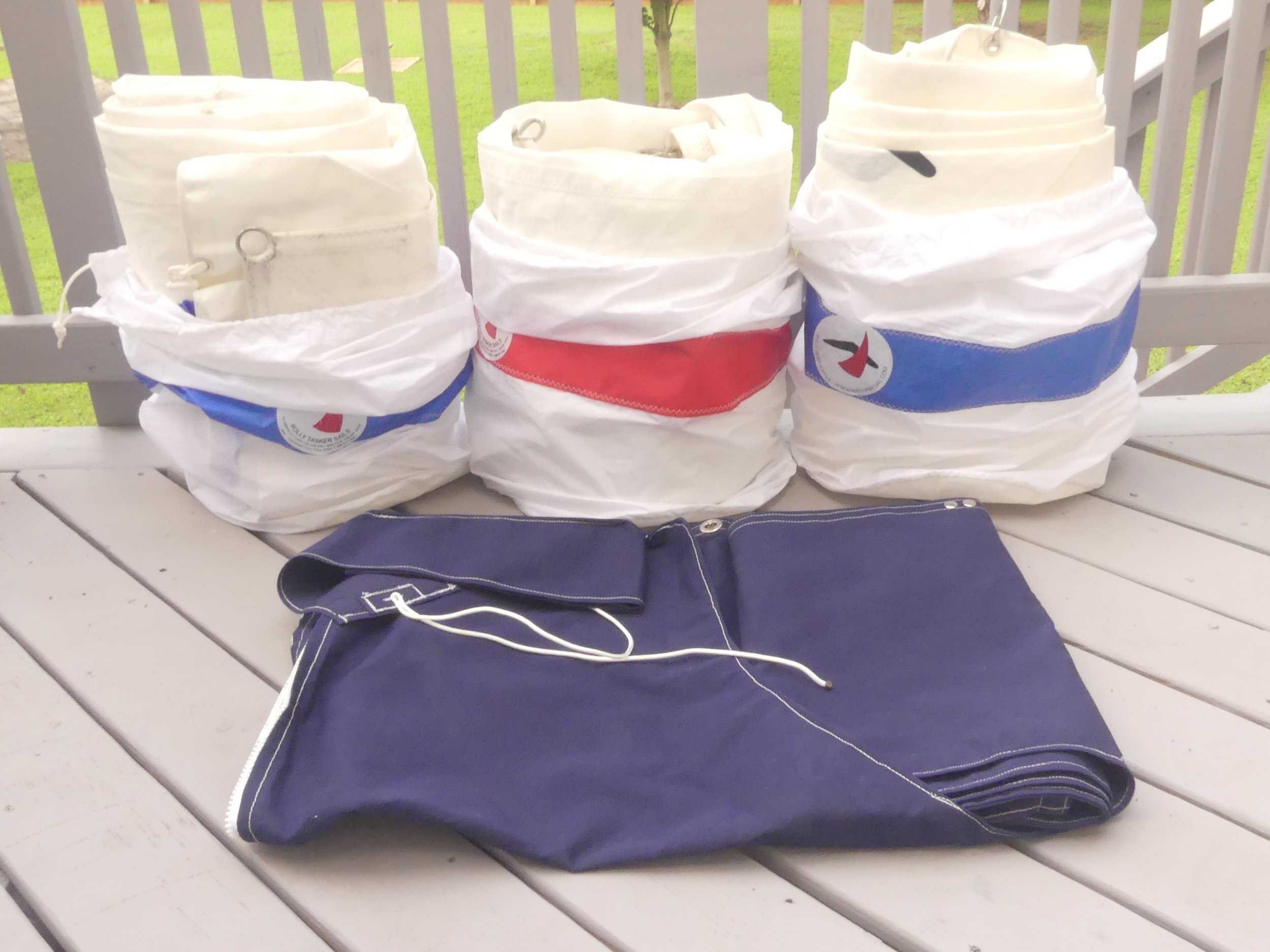 Main, 110, 90, and sail cover.JPG