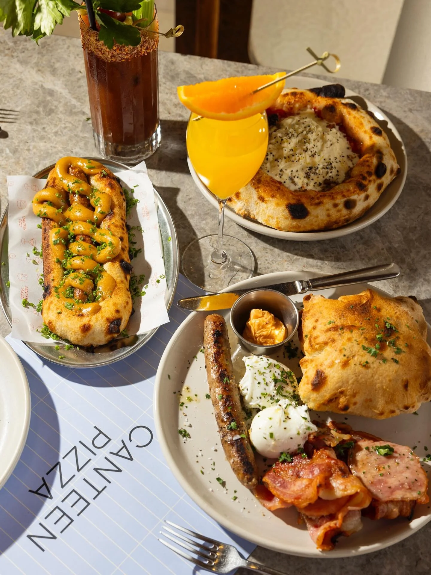 Rise and shine, people ☀️ Canteen Pizza @canteenpizza is doing mornings right.

Early starts, Breakfast Negronis, Spicy Marys, brekky style pizzettas, pila di pizze (gf) and the debut of the pizza dog.
We&rsquo;re listening.

Appetite shoot with @jac