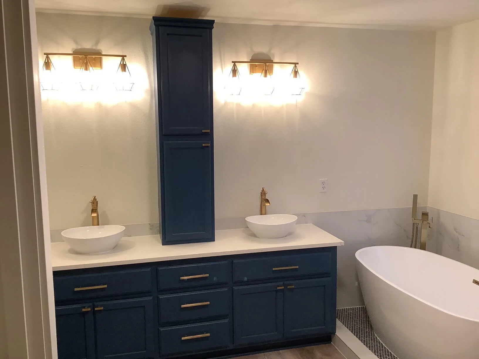 Sanded, primed, and painted cabinets