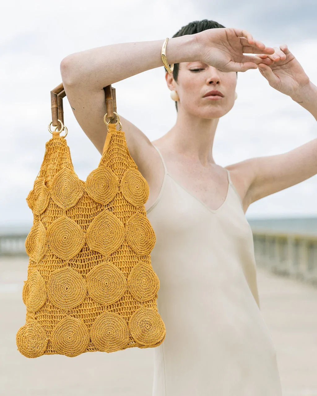 the-hold-enveloped-tote-ochre-crochet-bamboo-handles-2.webp