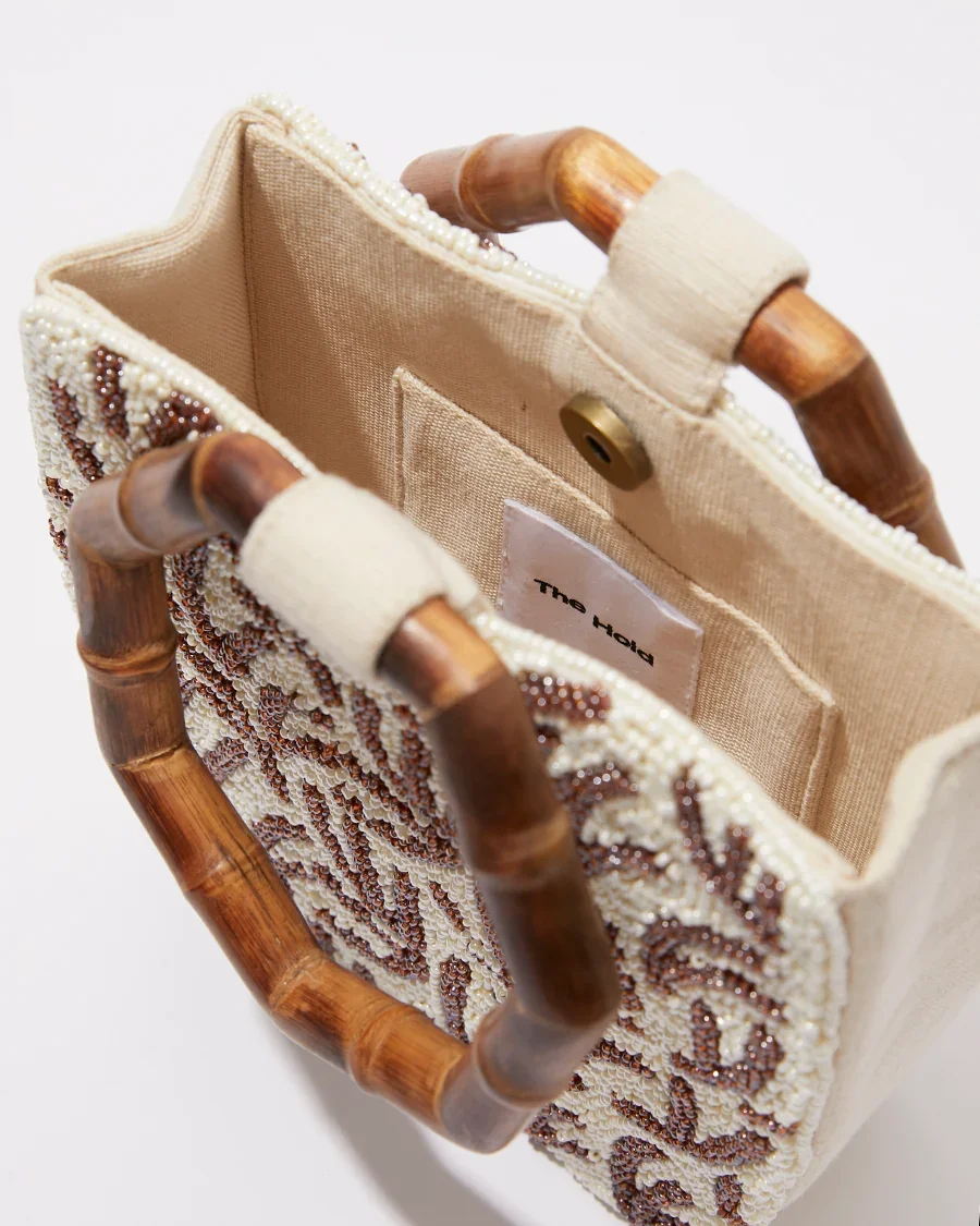 the-hold-symbolic-path-artisan-beaded-bag-bamboo-handle-5.webp