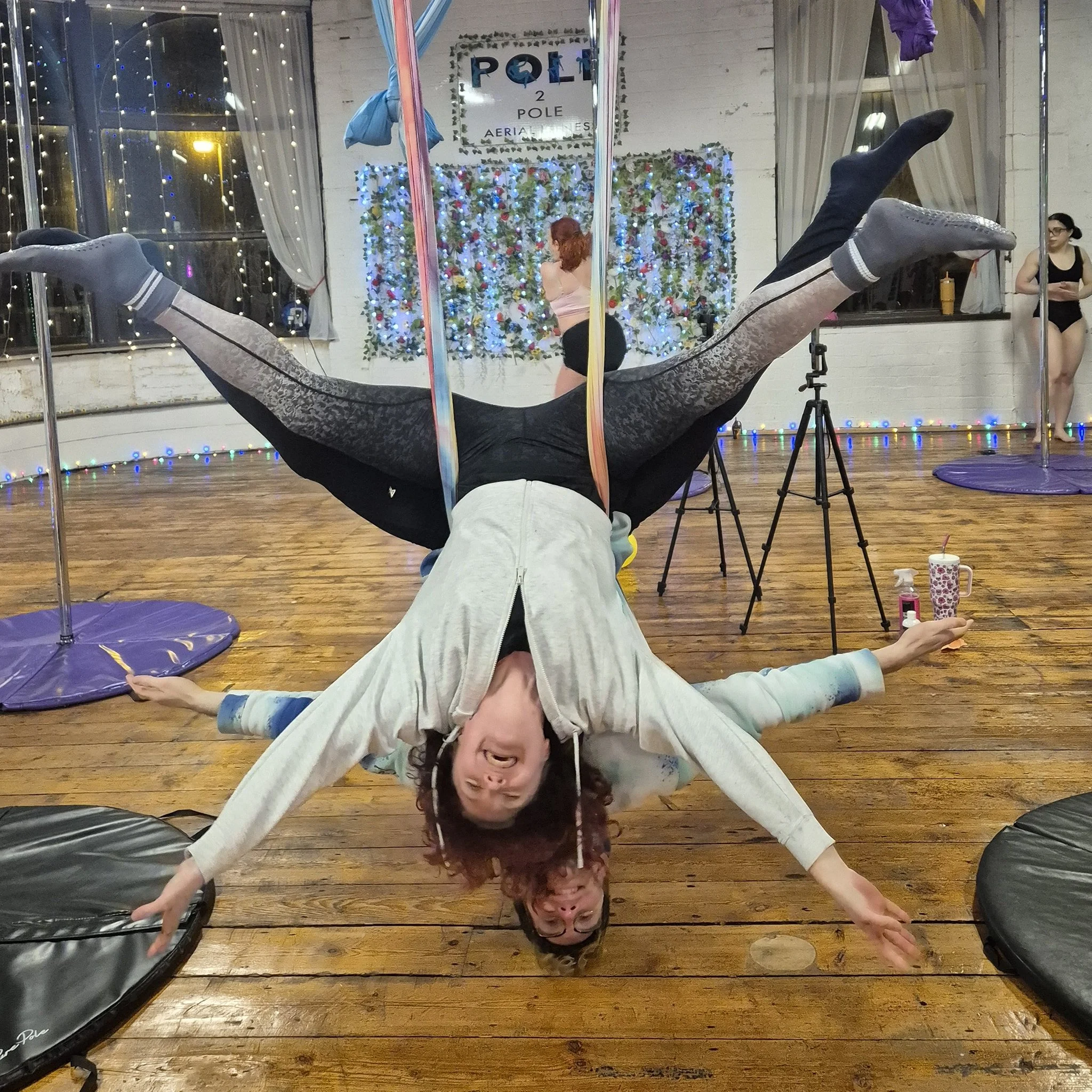 Take a look at our aerial playground students having fun in the aerial slings. Doubles is challenging but great fun. #aerialhammock  #aerialsling #polestudio