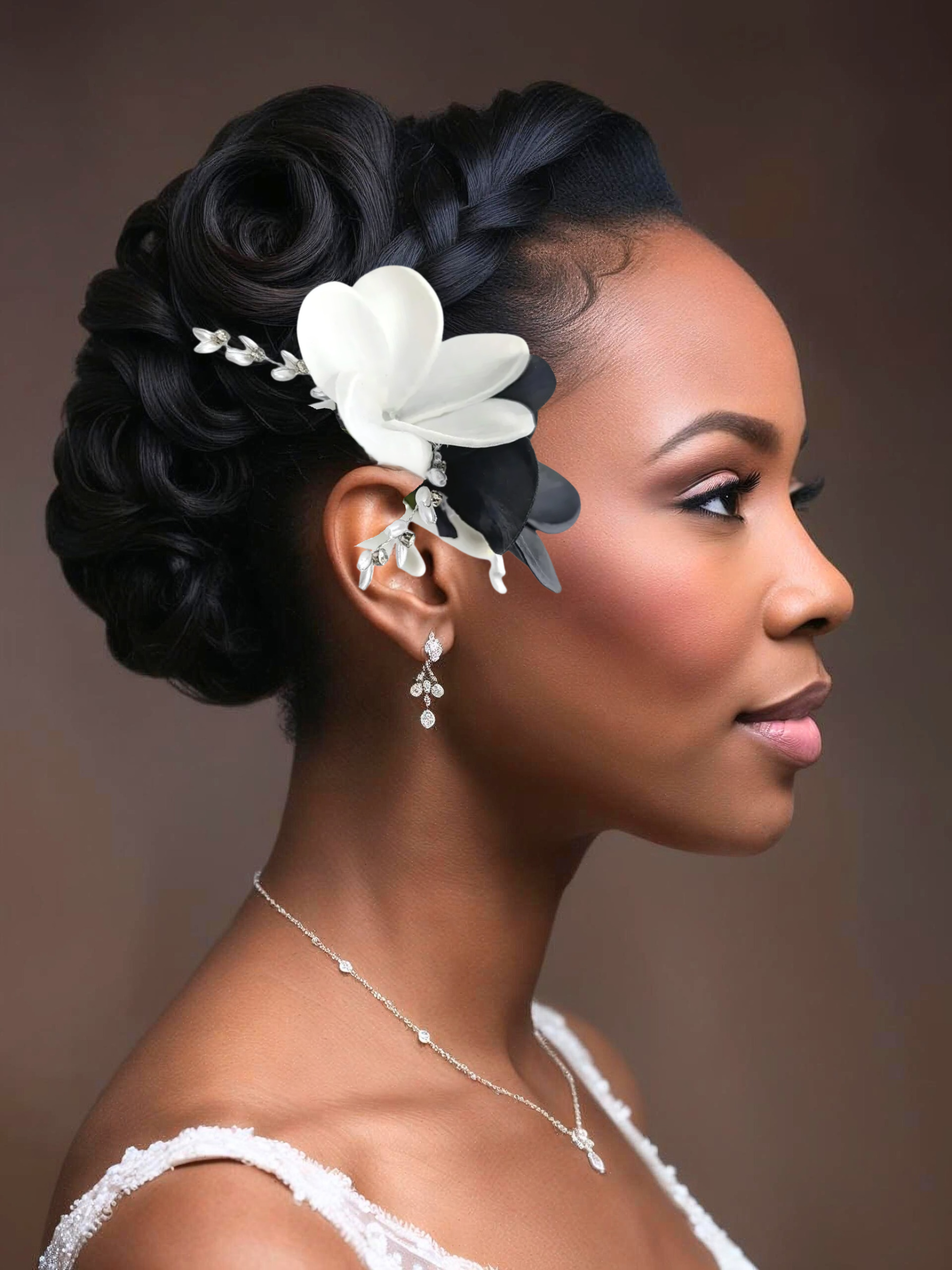 blacj woman with white and black plumeria hair flowers