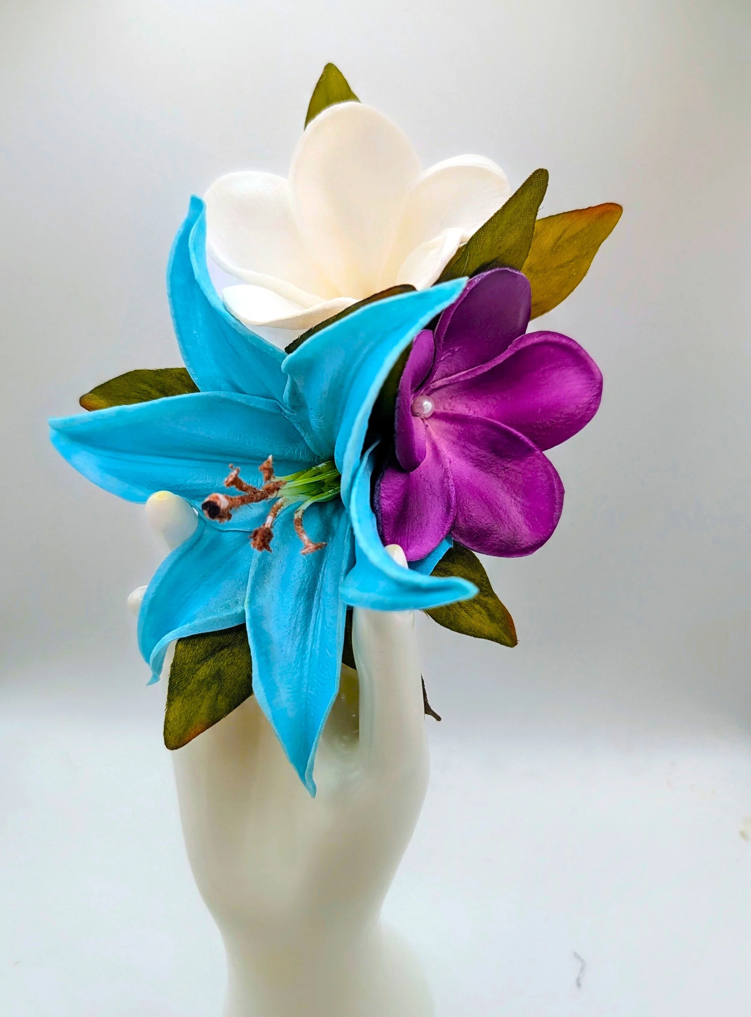 turquoise lily purple white plumeria bridal headpiece by Malama Pua Bridal