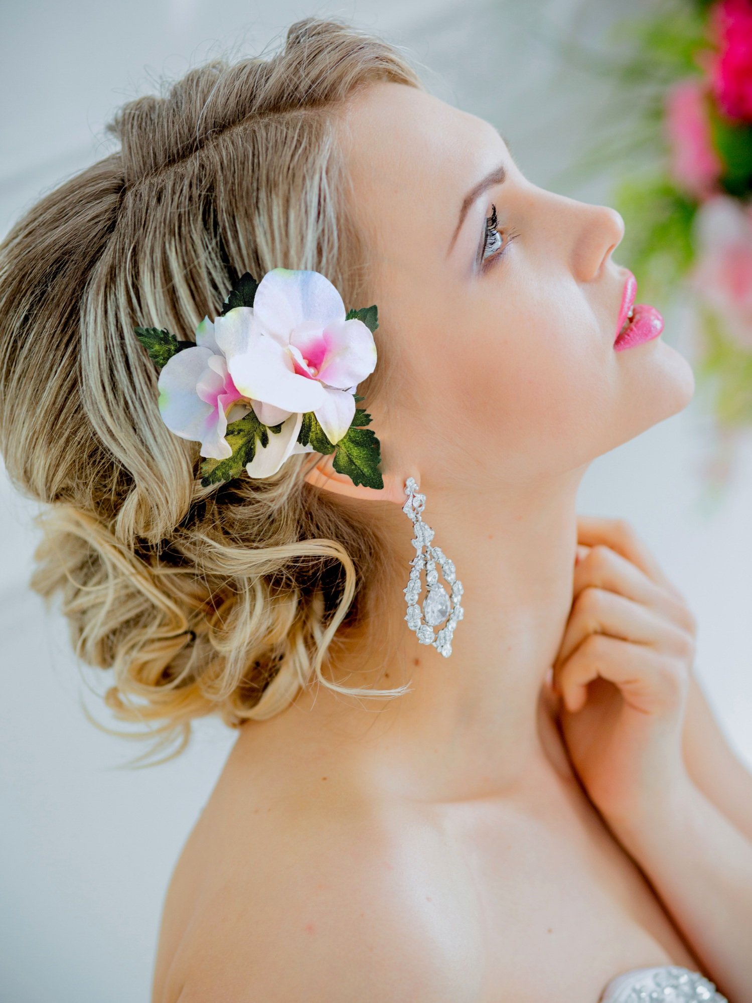Bride wearing double silk orchid orchid headpiece