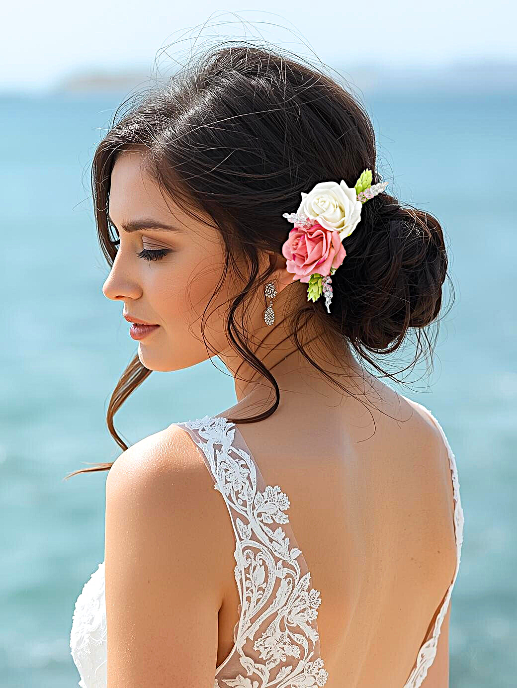 bride wearing pink white cream rose wedding headpiece